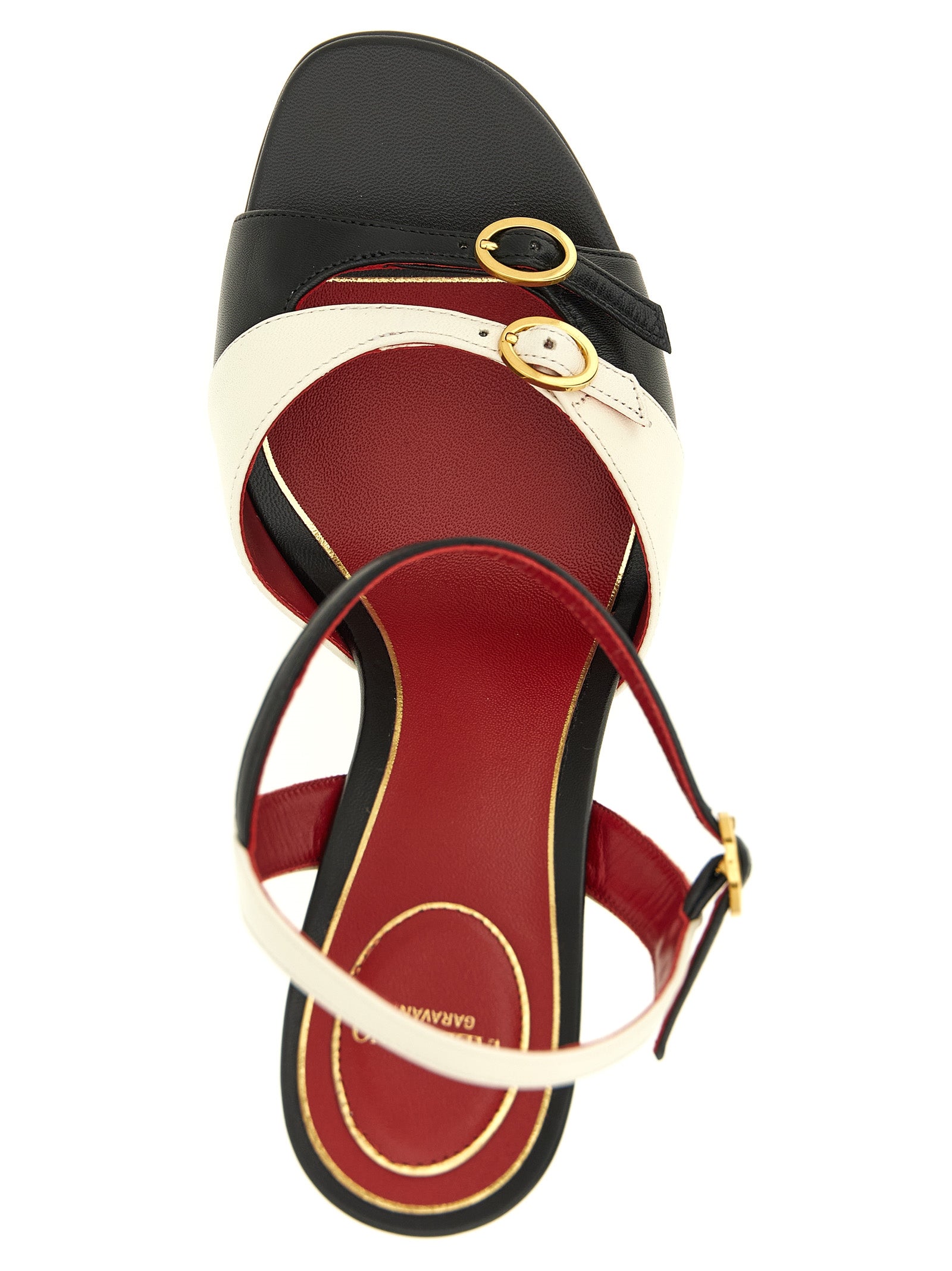 Step into elegance with Valentino Garavani's Bicolor Calfskin Stiletto Heel Sandals, where exquisite craftsmanship meets luxurious design for the discerning individual.