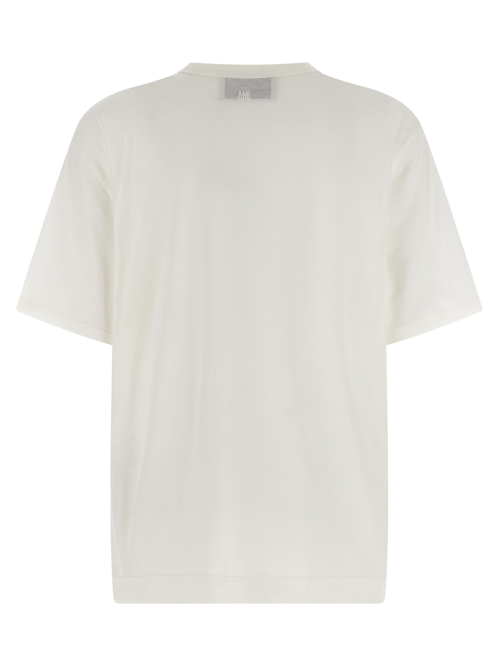 Discover the allure of the Ami Paris White Cotton T-Shirt, a blend of sophistication and comfort, perfect for elevating your wardrobe with timeless elegance.
