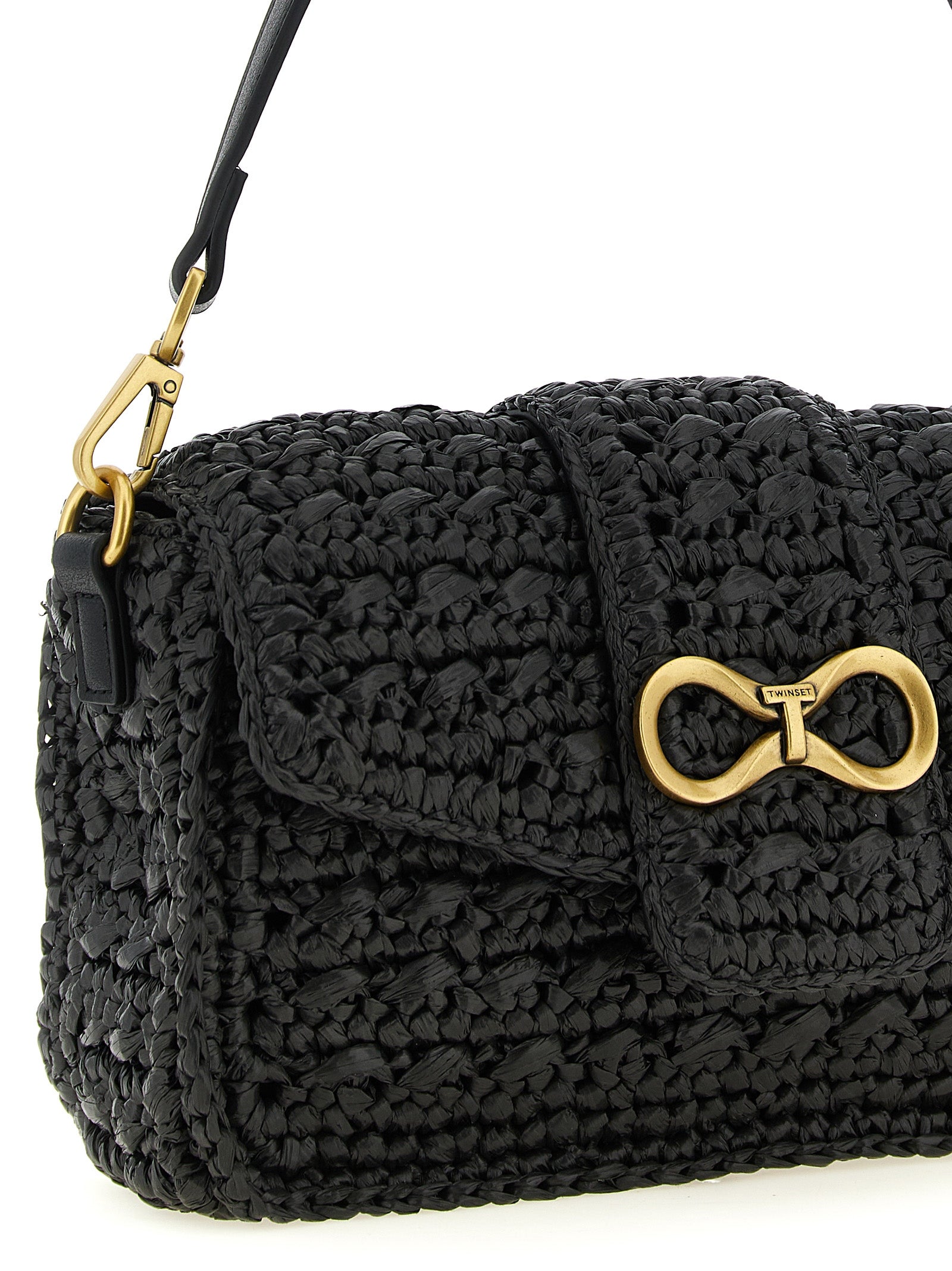 Discover the Twinset Black Polypropylene Crossbody Bag, a masterpiece of craftsmanship that elevates your style with its chic design and luxurious materials.