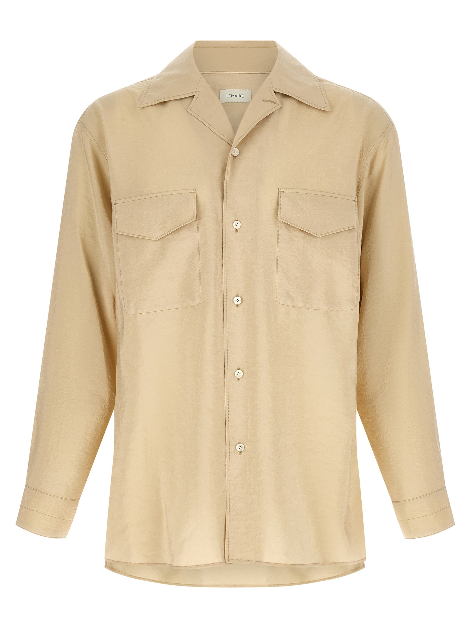 Discover the Lemaire Beige Silk Blouse, a masterpiece of dry silk blend craftsmanship that redefines elegance and sophistication for the discerning wardrobe.