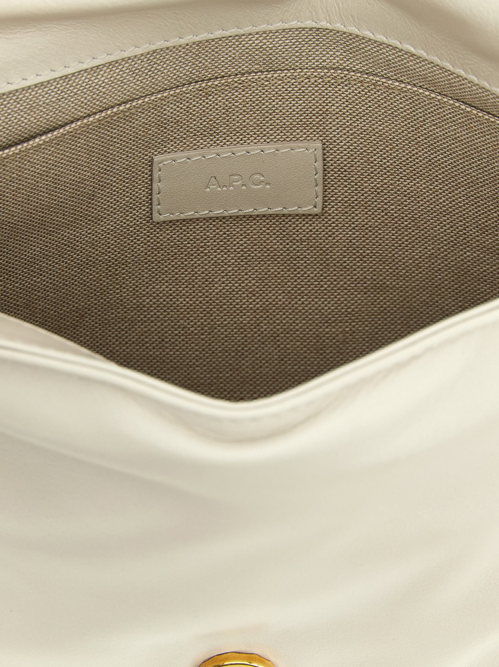 Discover the A.P.C. White Cowhide Crossbody Bag, a masterpiece of sumptuous leather and modern elegance, perfect for elevating your style with luxurious sophistication.
