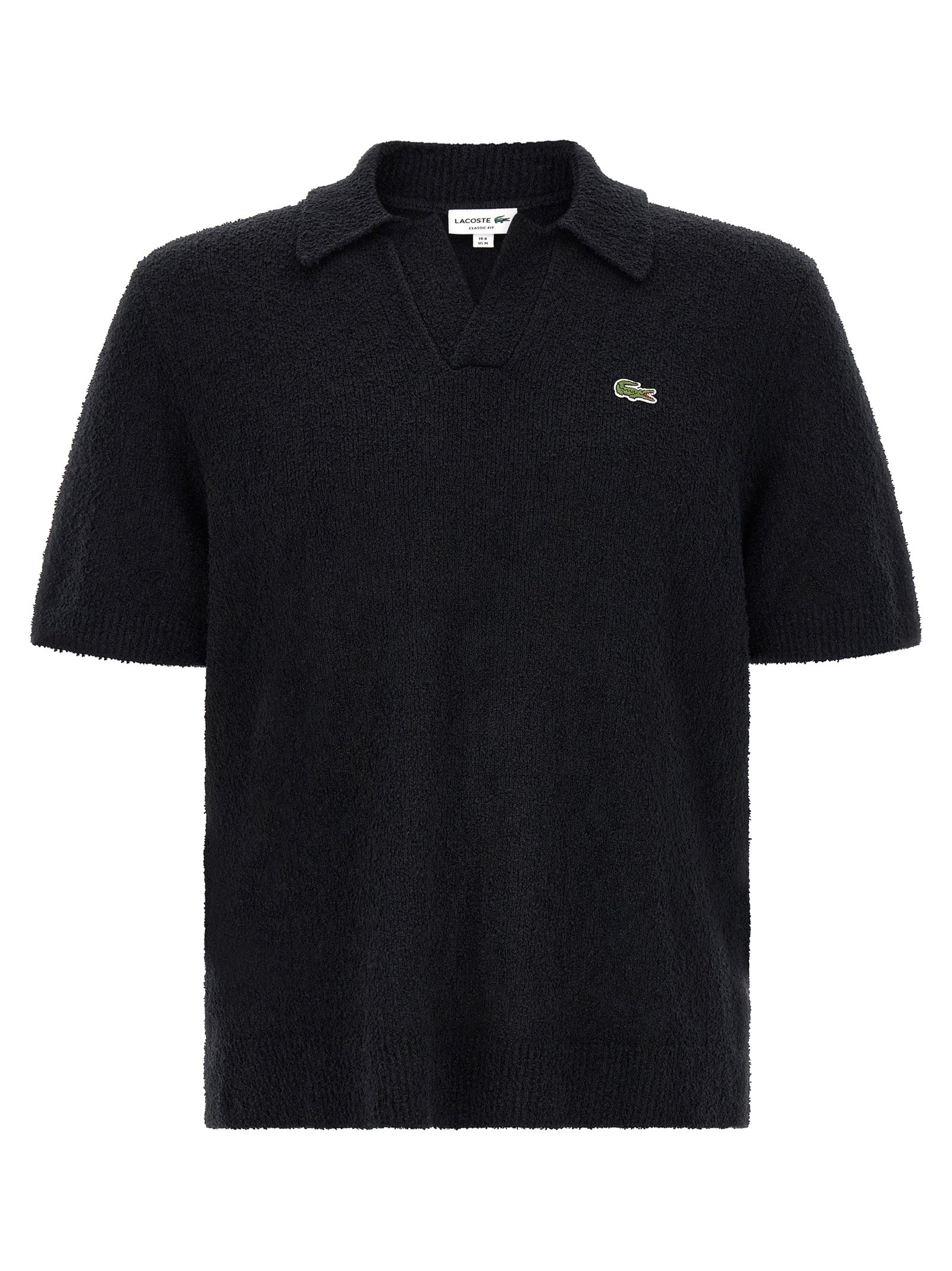 Elevate your style with the Lacoste Black Cotton Polo Shirt, a luxurious blend of cotton and polyamide, perfect for the discerning individual seeking timeless sophistication.