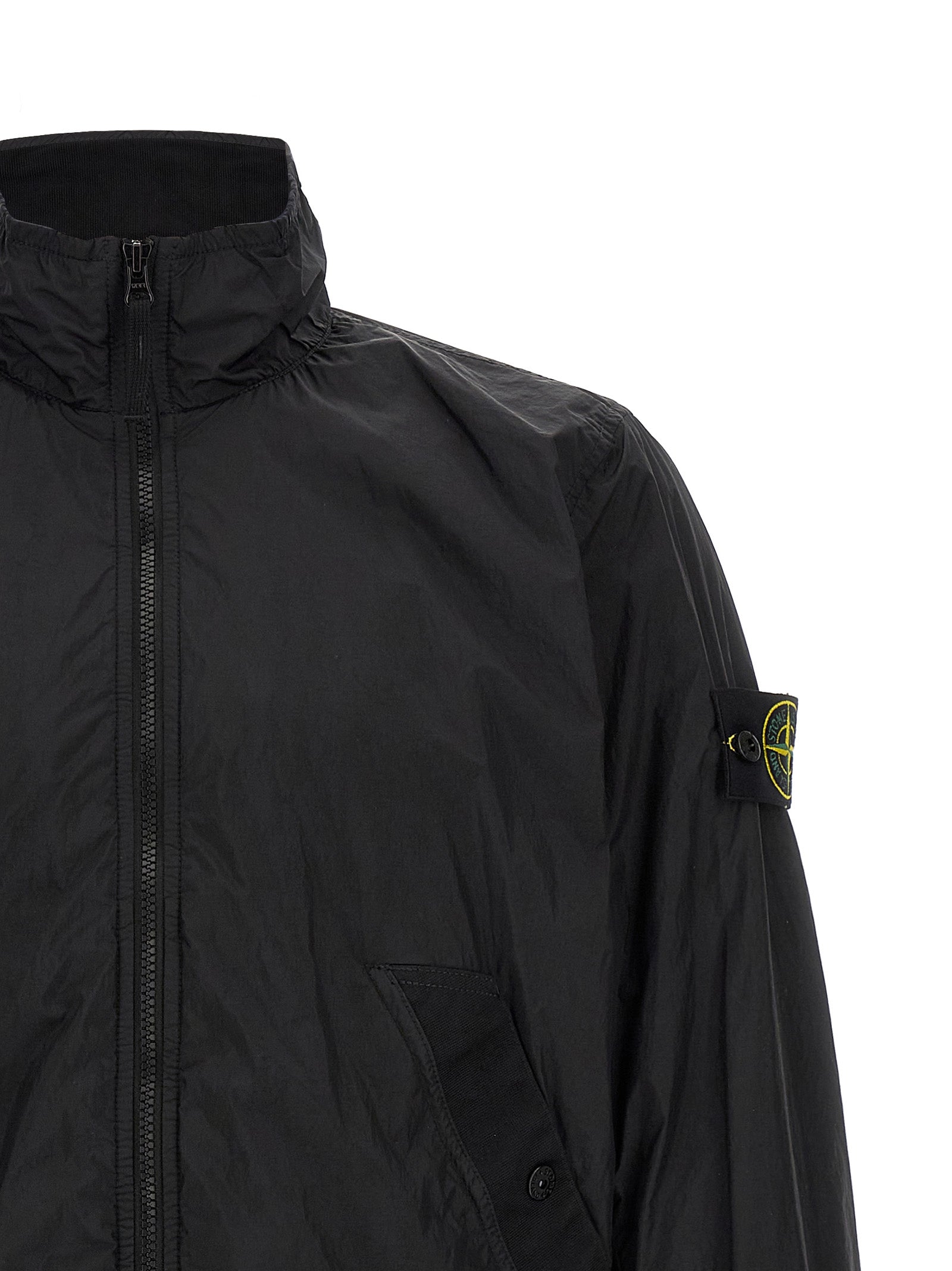 Discover the Stone Island Black Polyamide Full-Length Jacket, a luxurious blend of sustainable craftsmanship and modern elegance, perfect for the discerning individual.