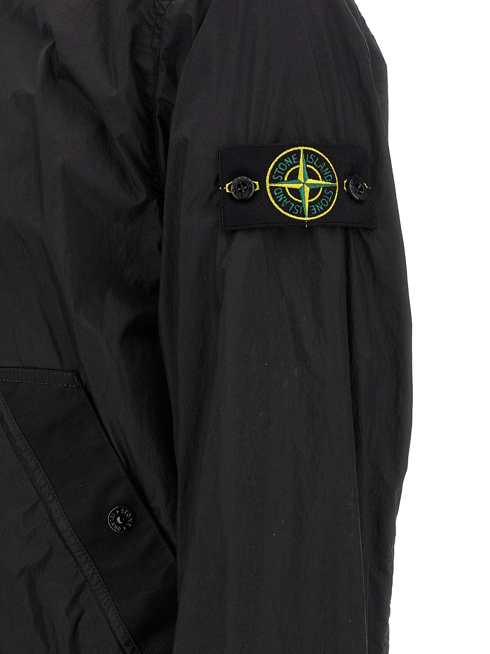 Discover the Stone Island Black Polyamide Full-Length Jacket, a luxurious blend of sustainable craftsmanship and sophisticated design, perfect for the discerning individual.