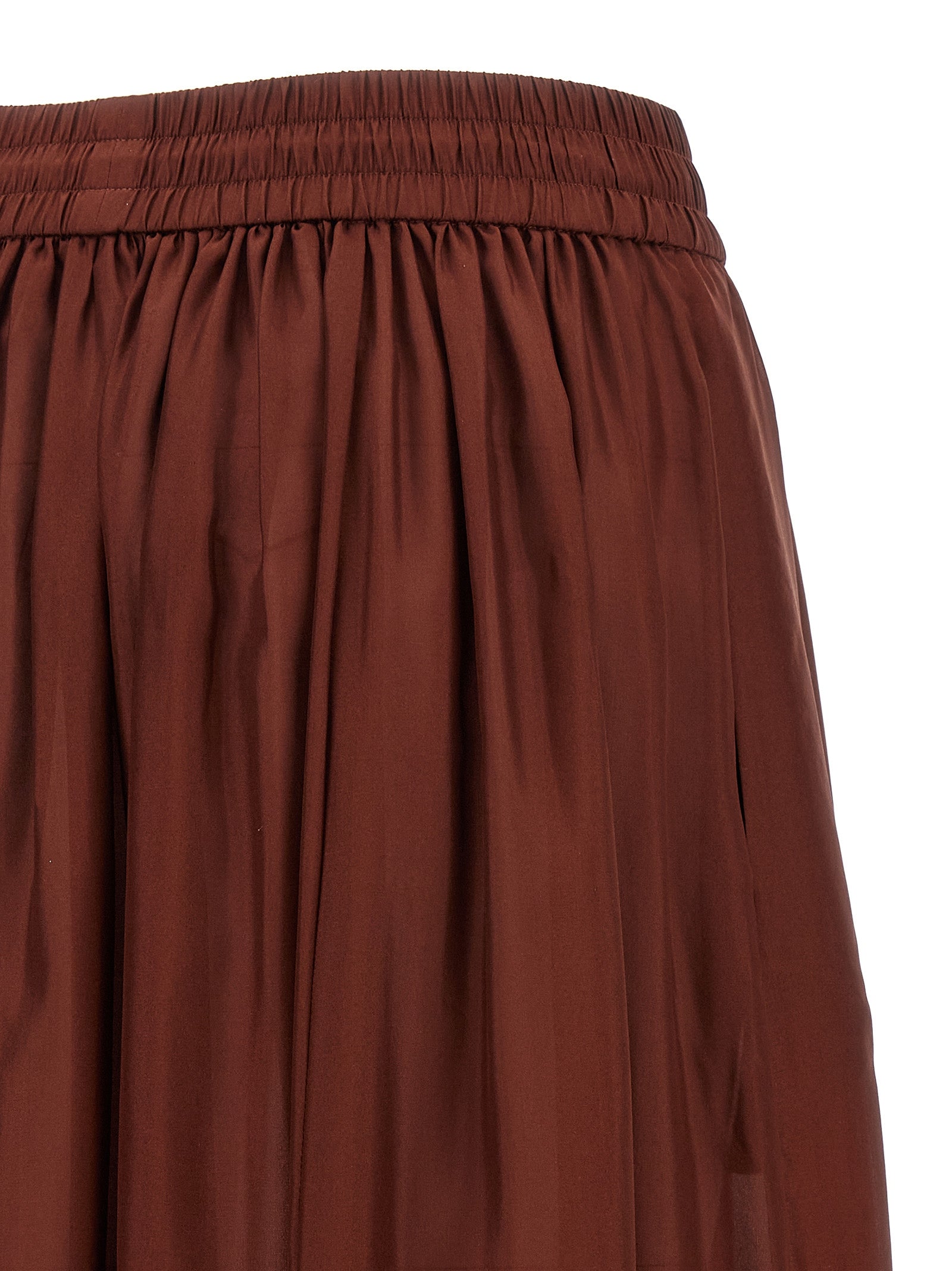 Elevate your elegance with the Zimmermann Bordeaux Silk Mini Skirt, a luxurious silk habotai piece that embodies sophistication and timeless allure for any occasion.