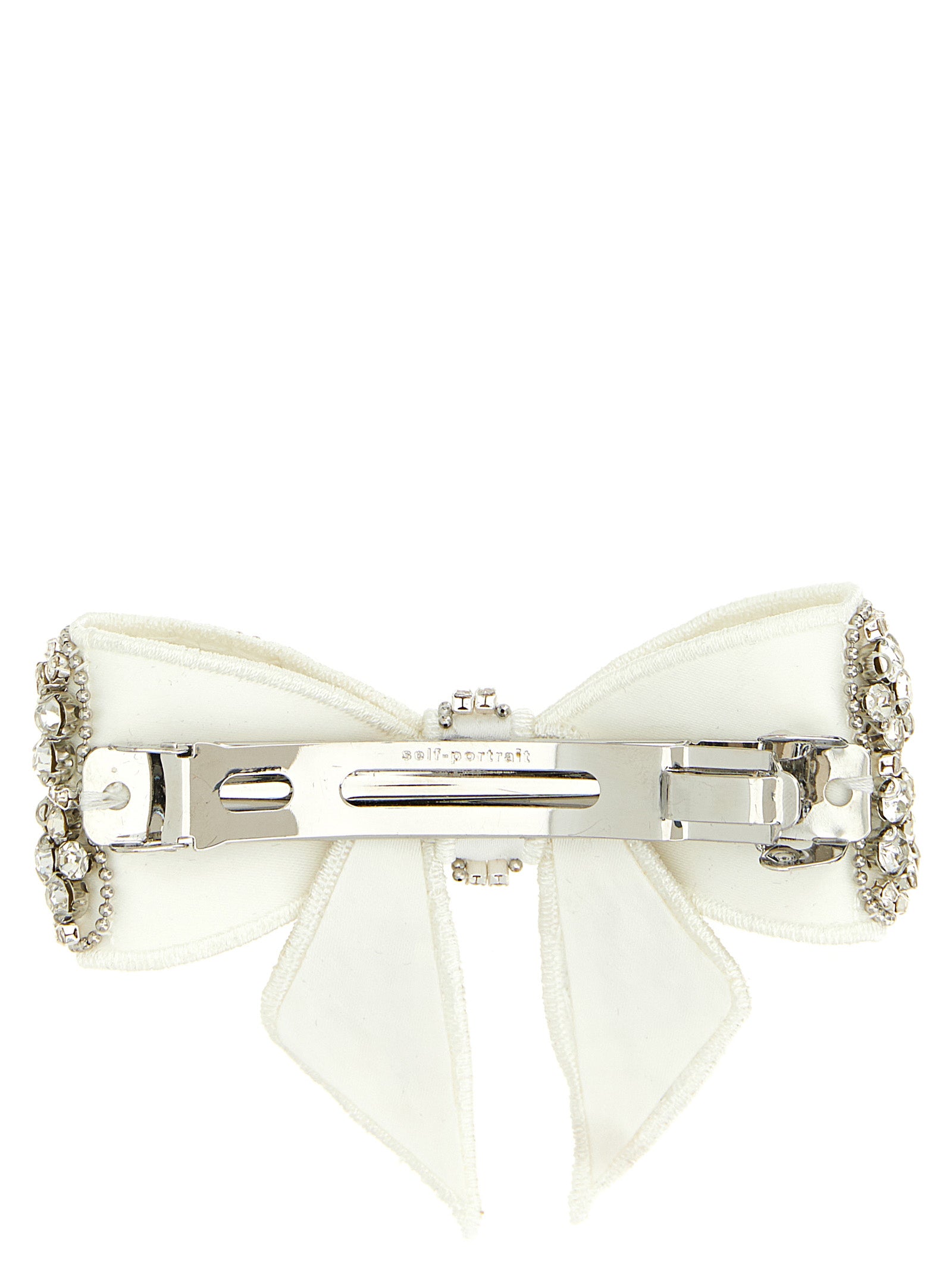Discover the Self-Portrait White Polyester Hair Clip, a luxurious accessory adorned with crystals, perfect for elevating your elegance and sophistication.