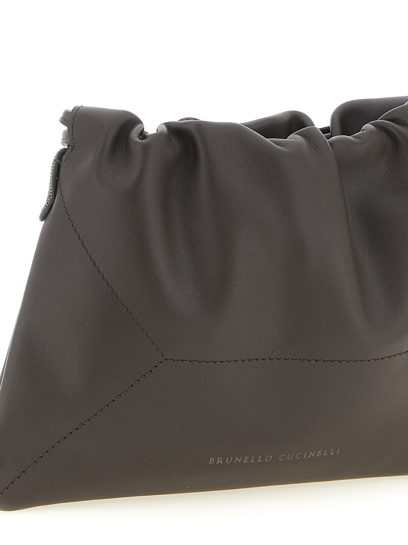 Indulge in the exquisite Brunello Cucinelli Brown Calfskin Clutch Bag, a testament to Italian craftsmanship and timeless elegance, perfect for elevating any occasion.