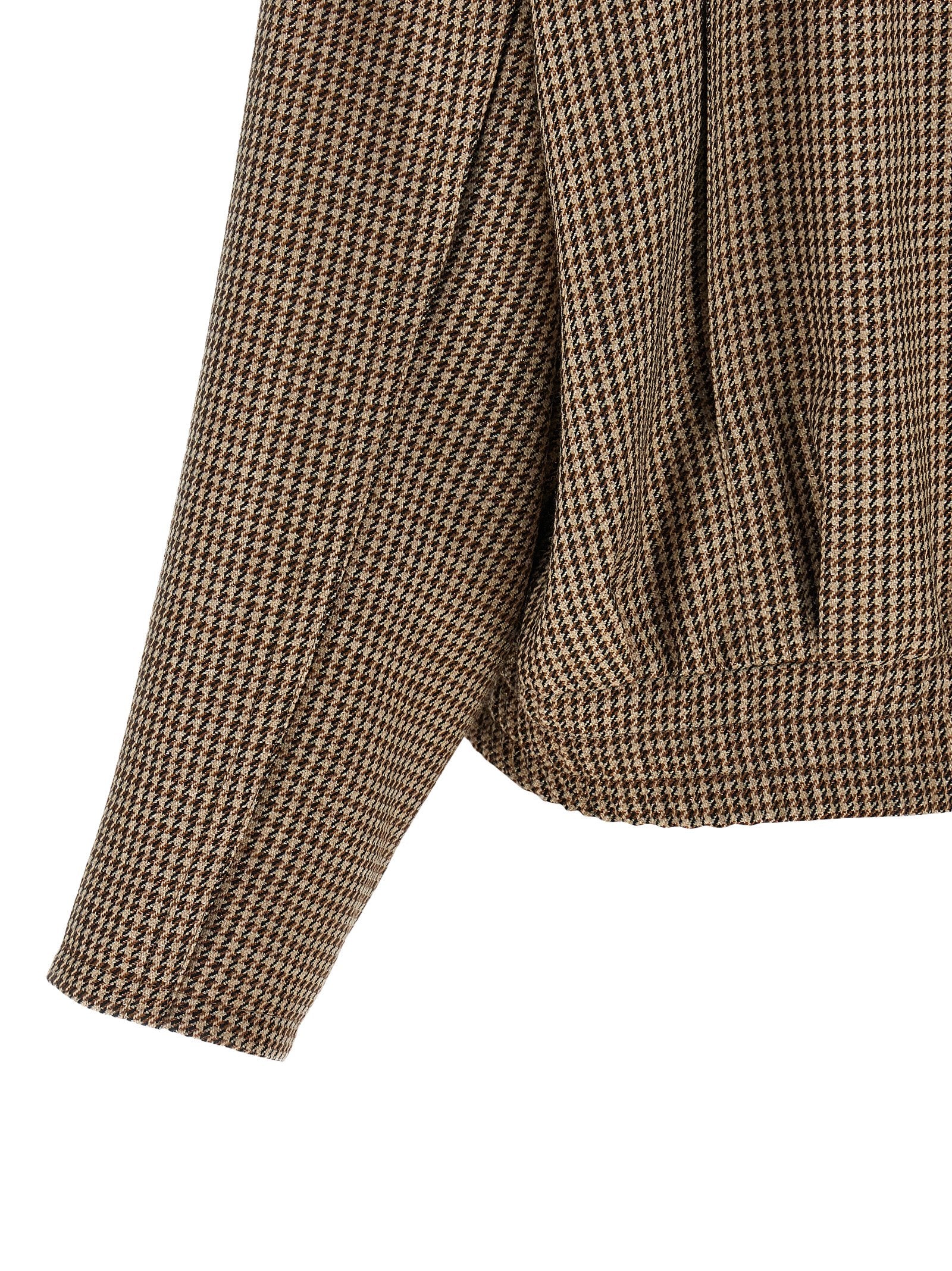 Discover the Brunello Cucinelli Brown Virgin Wool Jacket, a masterpiece of Italian craftsmanship, blending luxurious virgin wool with iconic design for timeless elegance.