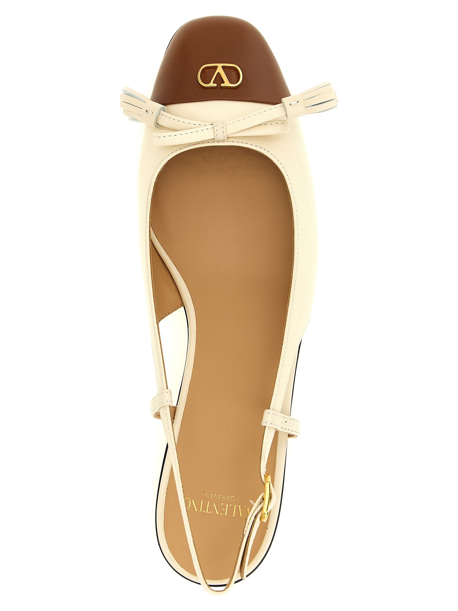 Step into a world of elegance with Valentino Garavani's Black Leather Ballet Flats, where exquisite craftsmanship meets modern sophistication for the discerning individual.