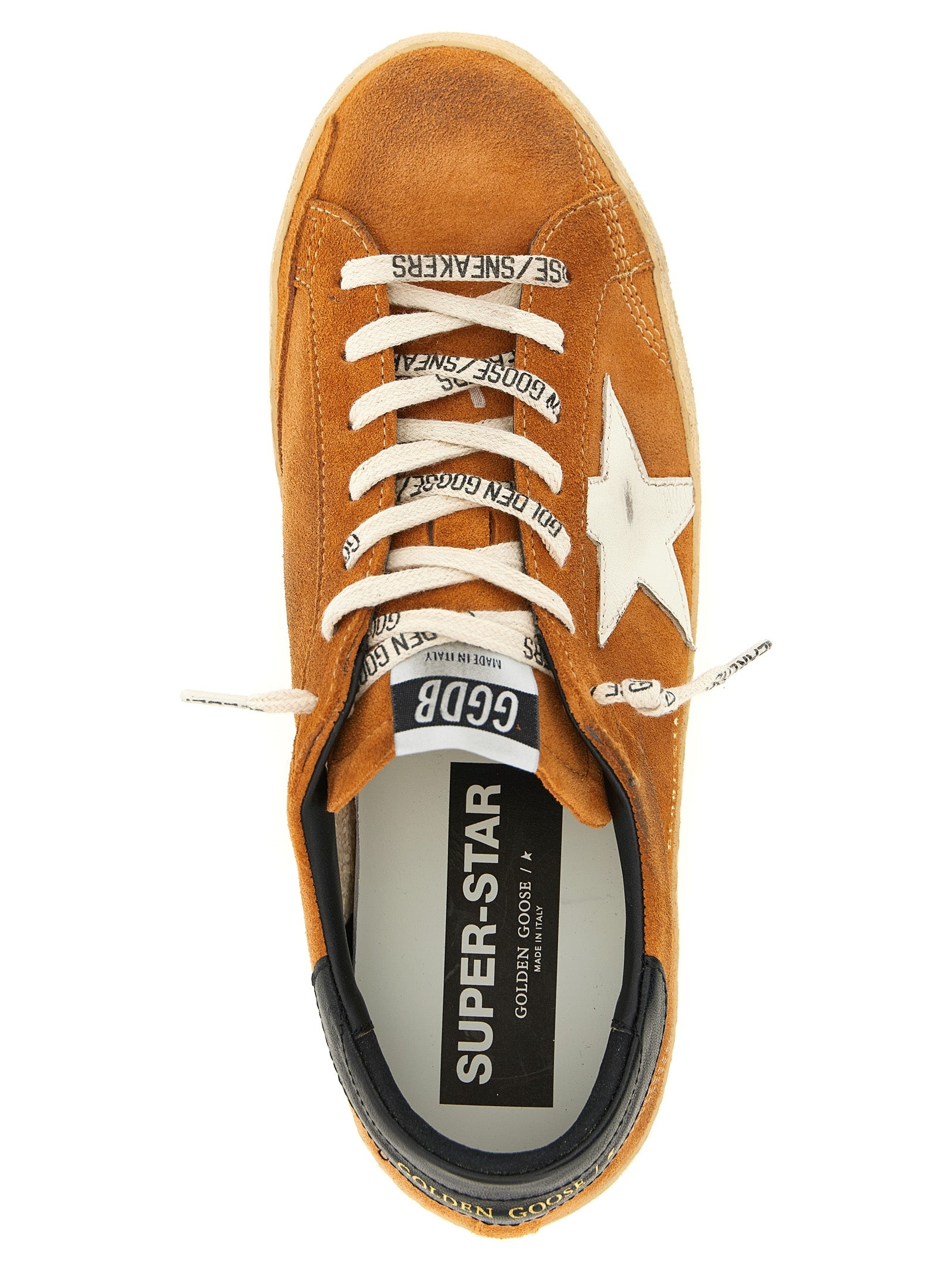 Elevate your style with Golden Goose Orange Cowhide Low Top Sneakers, where Italian craftsmanship meets vibrant luxury, perfect for the discerning individual seeking bold sophistication.
