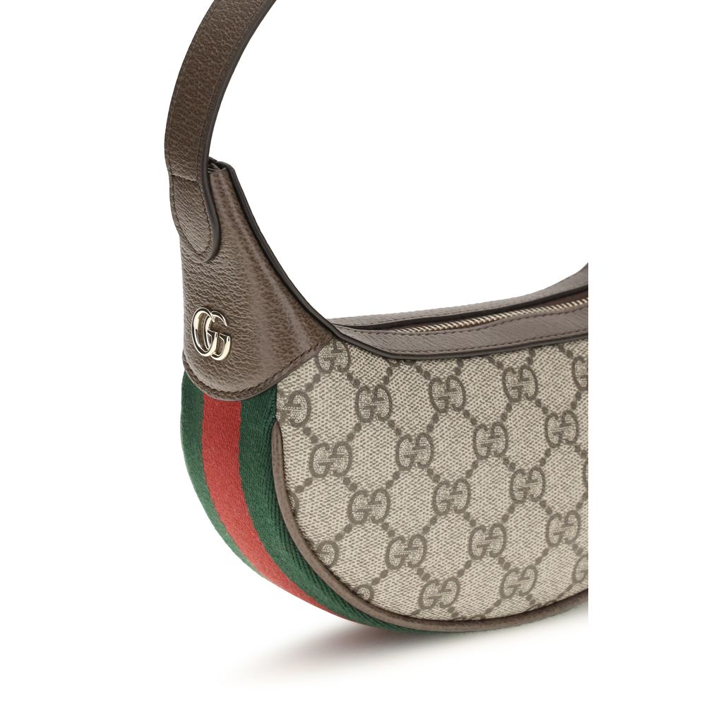 Indulge in the Gucci Beige Fabric Shoulder Bag, a masterpiece of luxury and practicality, crafted with exquisite GG monogram fabric and leather trims for timeless elegance.