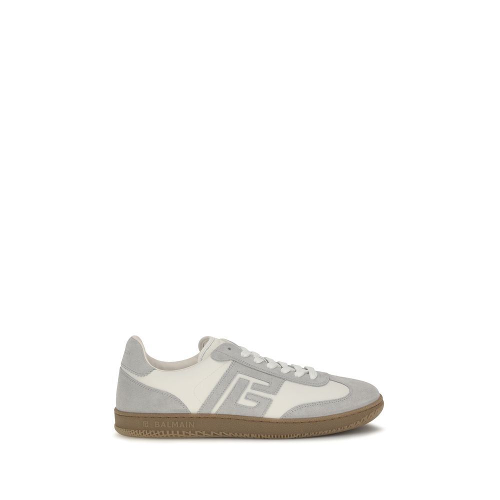 Experience the exquisite craftsmanship of Balmain White Calf Leather Bos Taurus Athletic Sneakers, where luxury meets contemporary design for the discerning individual.