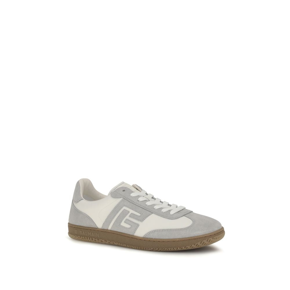 Experience the epitome of luxury with Balmain White Calf Leather Bos Taurus Athletic Sneakers, crafted from premium materials for a sophisticated, stylish statement.