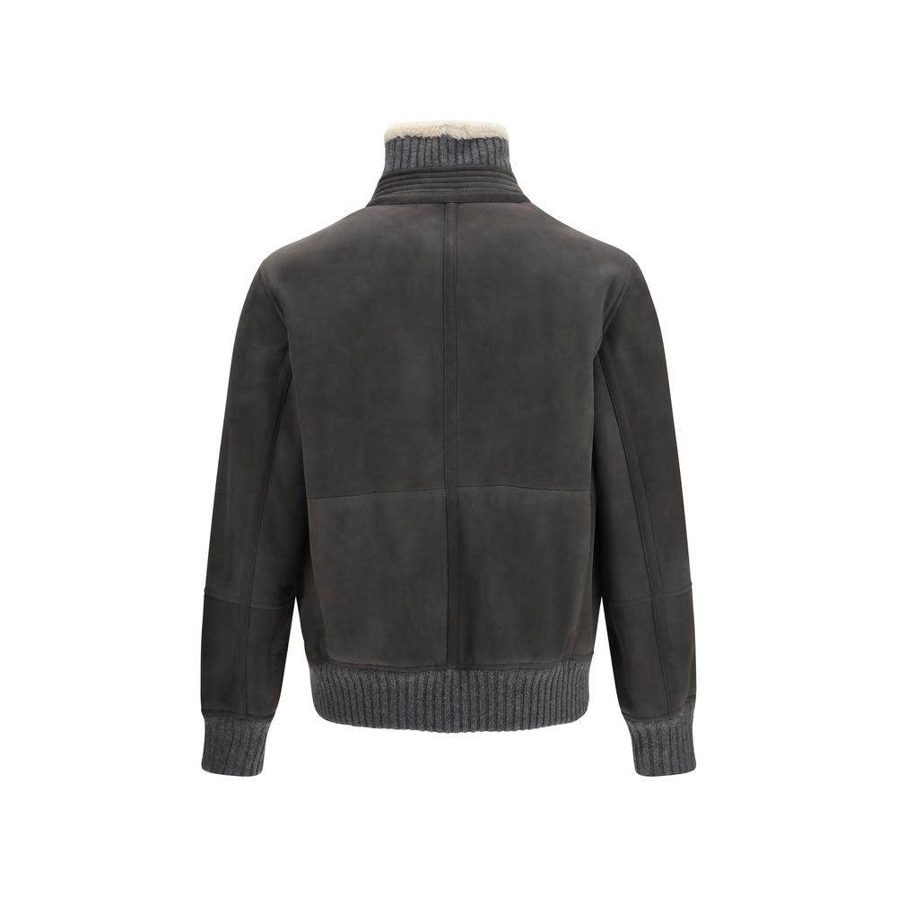 Discover the Brunello Cucinelli Gray Wool Oves Aries Full-Length Jacket, a masterpiece of 100% Merino wool that embodies timeless elegance and sophisticated craftsmanship.