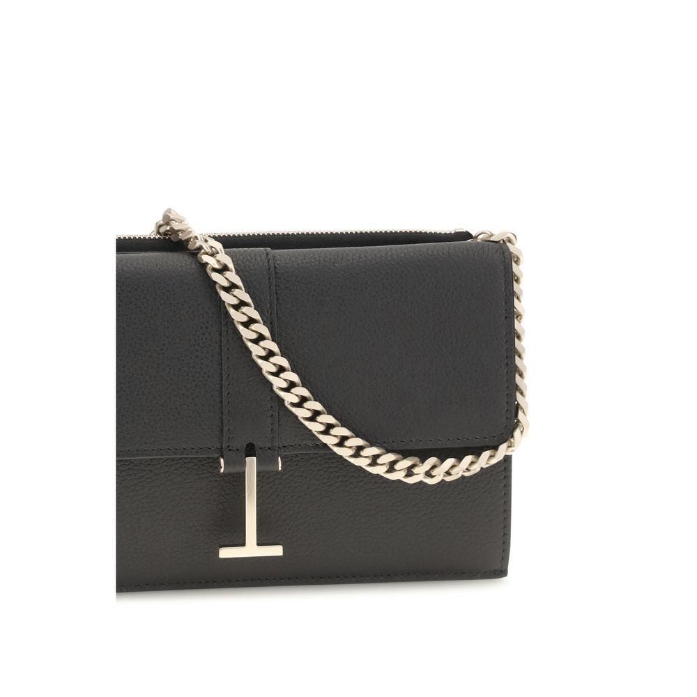 Elevate your elegance with the Tom Ford Black Calf Leather Bos Taurus Shoulder Bag, a masterpiece of refined design and luxurious craftsmanship that embodies sophistication.
