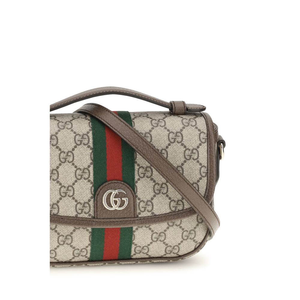 Elevate your style with the Gucci Beige Fabric Handbag, a masterpiece of luxury crafted in coated GG monogram fabric, embodying timeless elegance for the discerning individual.