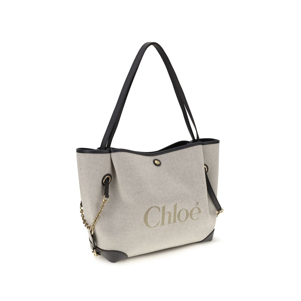 Elevate your style with the Chloé Gray Cotton Shoulder Bag, a luxurious blend of cotton canvas and calfskin, embodying modern sophistication for the discerning individual.