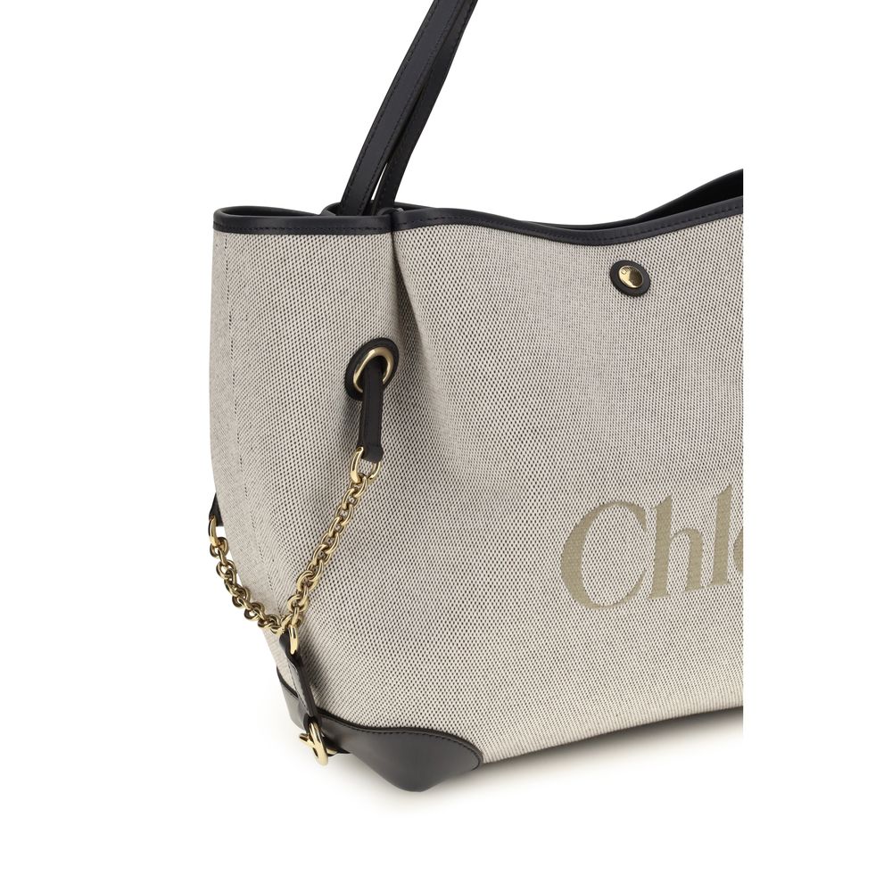 Elevate your style with the Chloé Gray Cotton Shoulder Bag, a luxurious blend of cotton canvas and calfskin, embodying modern sophistication and timeless elegance.
