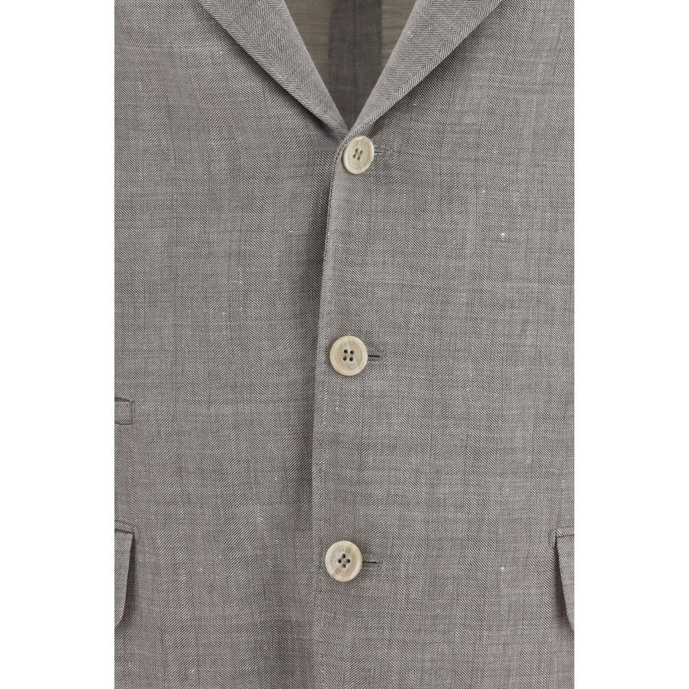 Discover the Brunello Cucinelli Beige Linen Full-Length Jacket, a masterpiece of deconstructed elegance, crafted from luxurious linen and merino wool for timeless sophistication.