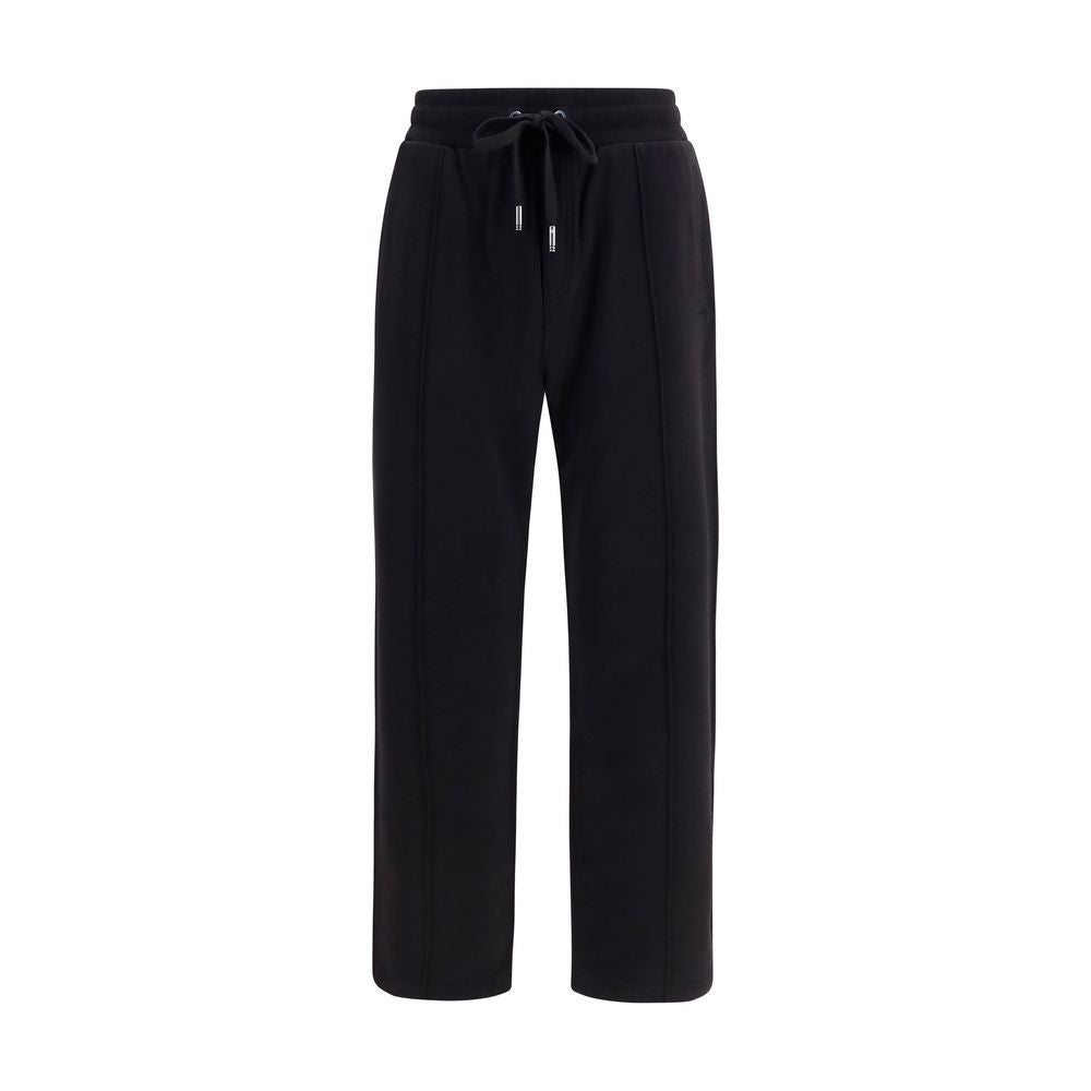 Experience the exquisite Dolce & Gabbana Black Cotton Joggers, a blend of luxurious comfort and contemporary design, perfect for effortless elegance in every moment.