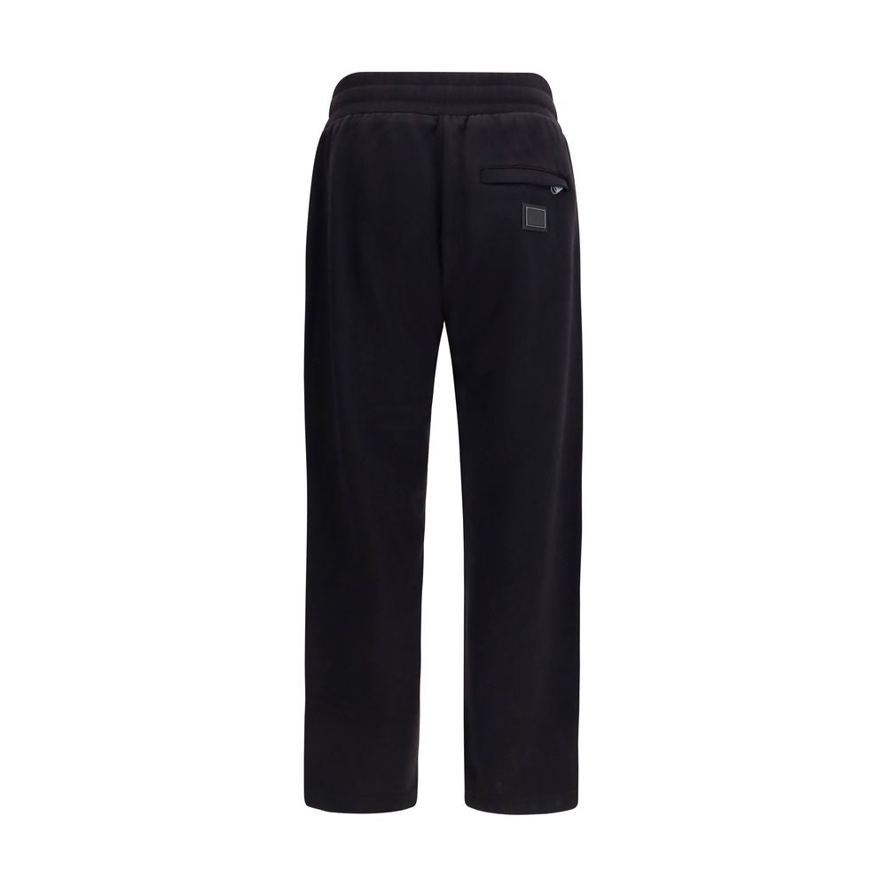 Experience the allure of Dolce & Gabbana Black Cotton Joggers, crafted from 100% cotton, blending comfort and sophistication for the modern connoisseur.