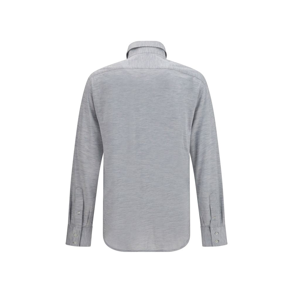 Discover the Brunello Cucinelli Gray Silk Dress Shirt, a luxurious blend of silk and cotton, embodying timeless elegance and refined sophistication for the discerning individual.