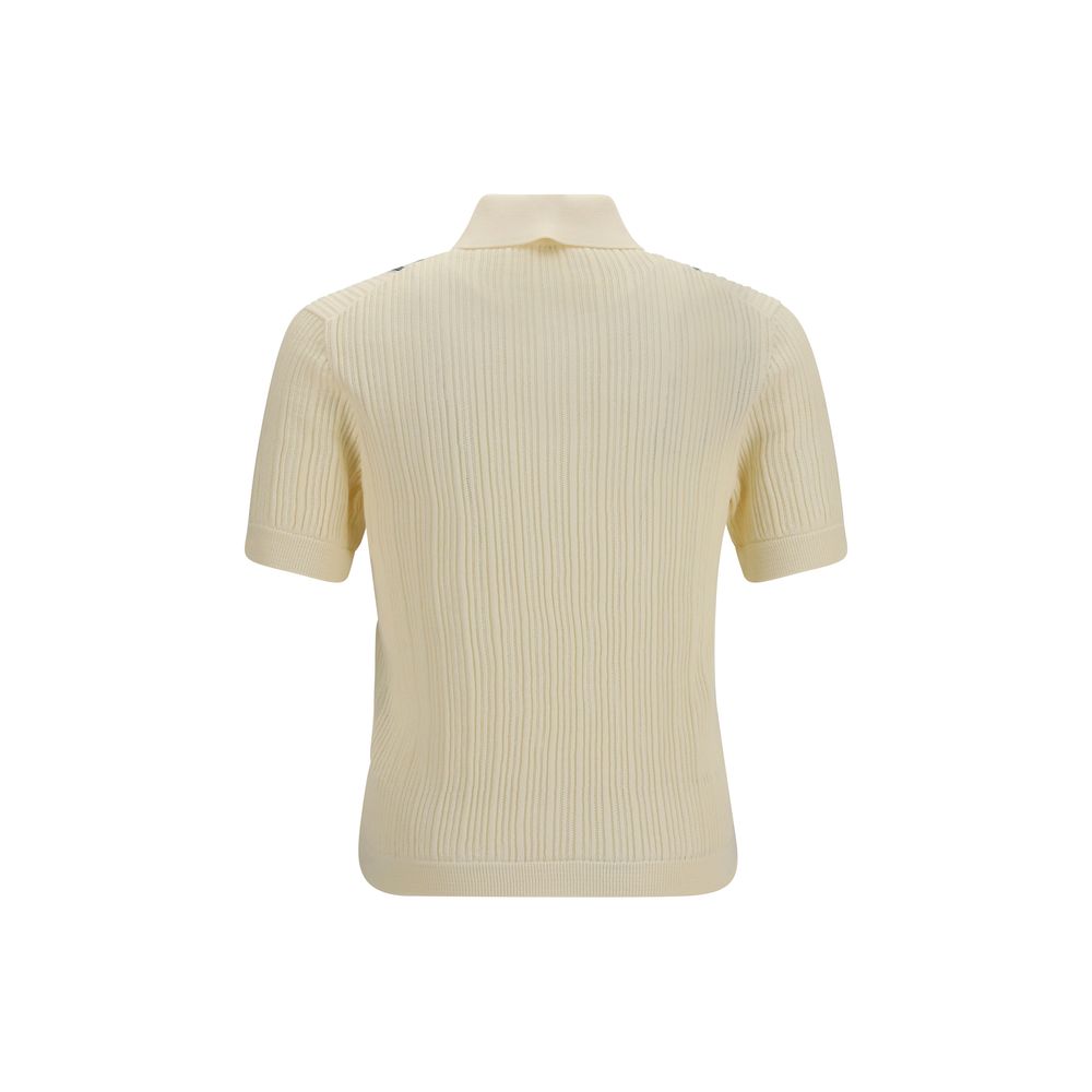 Discover the Versace Beige Cotton Polo Shirt, a blend of exquisite craftsmanship and luxury, perfect for those who embody elegance and sophistication.
