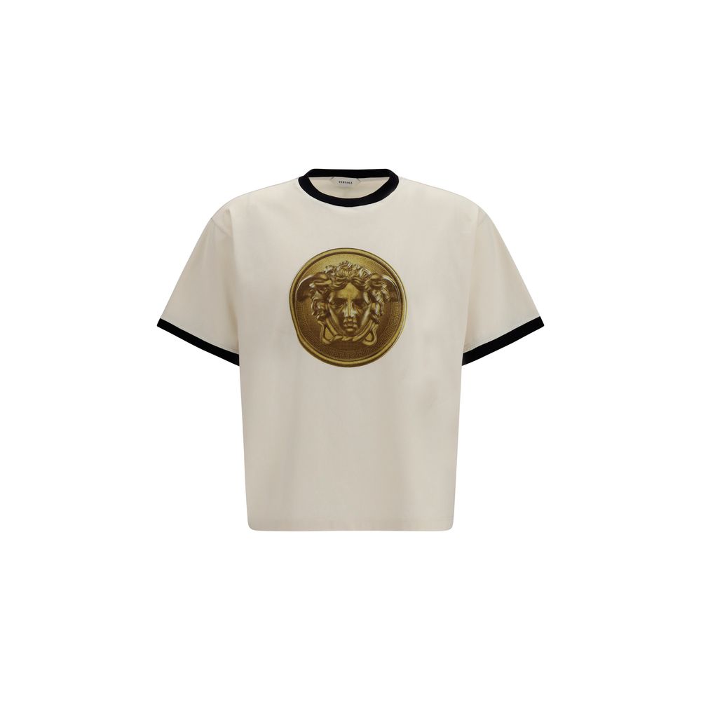 Elevate your wardrobe with the Versace Beige Cotton T-Shirt, a luxurious blend of comfort and iconic design, featuring the captivating Medusa Coin graphic for timeless sophistication.