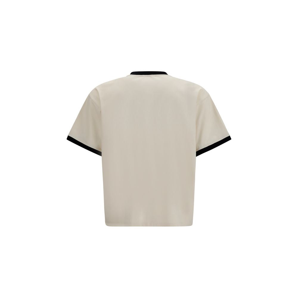 Elevate your wardrobe with the Versace Beige Cotton T-Shirt, a masterpiece of luxury and comfort, featuring an iconic Medusa Coin graphic for timeless sophistication.