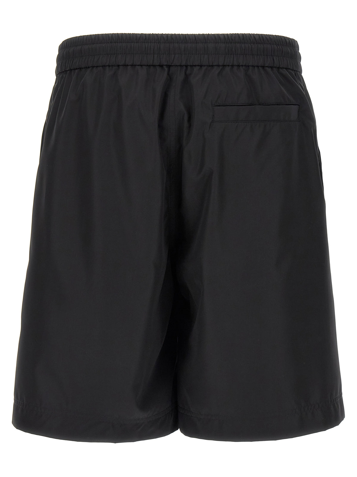 Indulge in the sophistication of Givenchy Black Polyester Bermuda Shorts, where effortless luxury meets contemporary design, perfect for the discerning trendsetter.