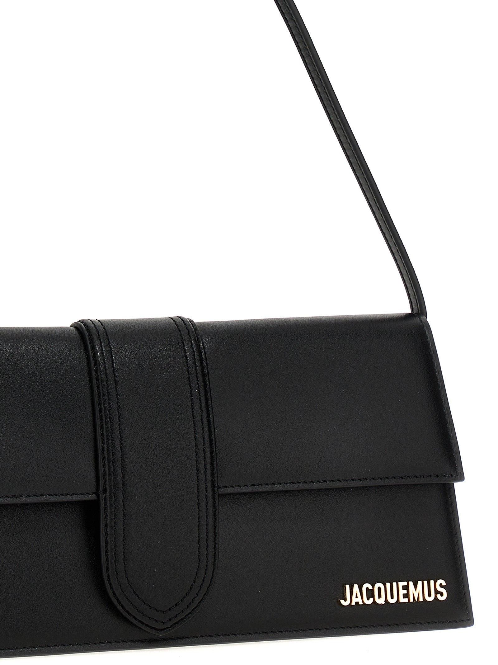Discover the Jacquemus Black Cowhide Shoulder Bag, a masterpiece of Italian craftsmanship that embodies timeless elegance and sophistication for every occasion.