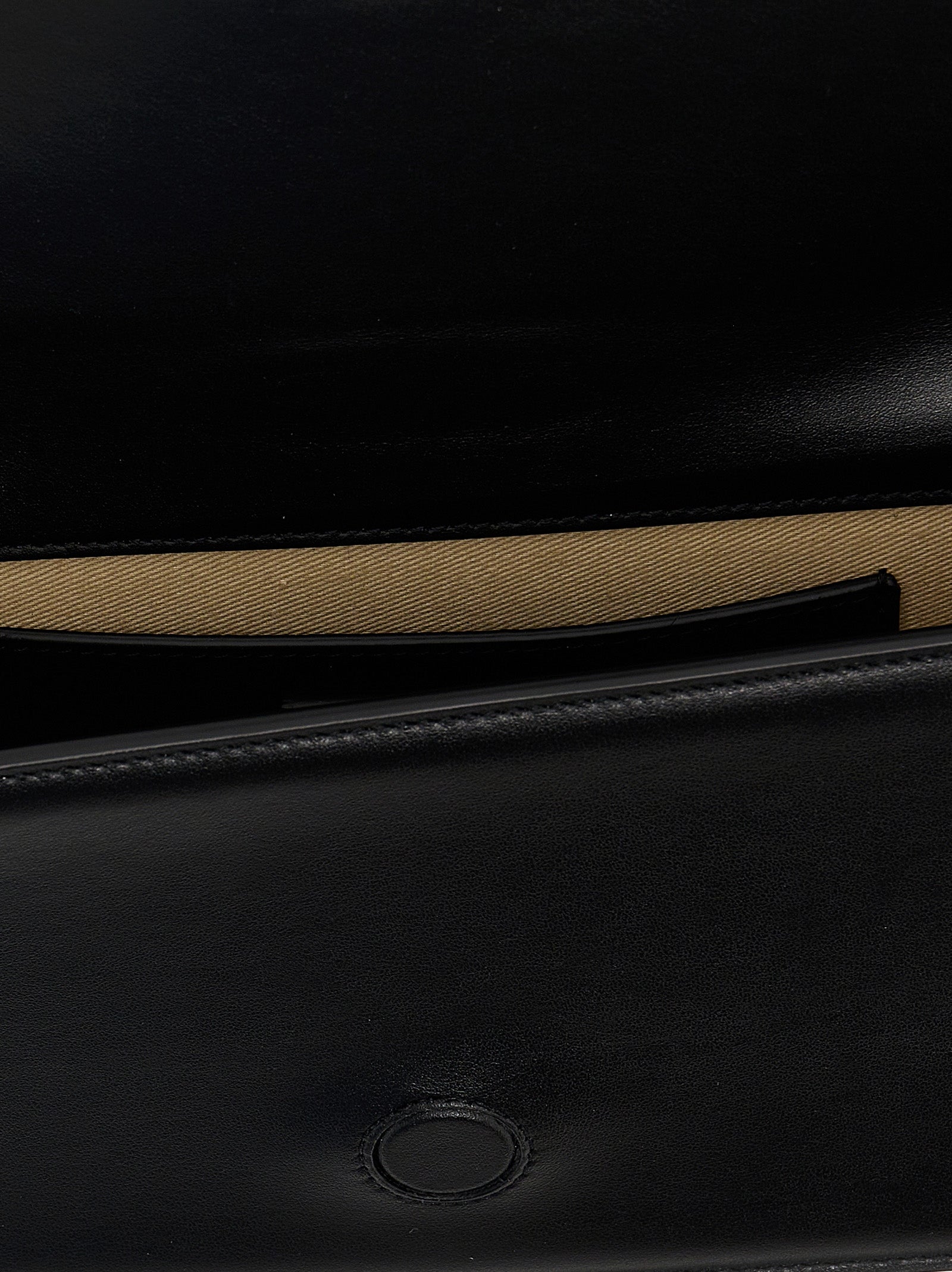 Discover the Jacquemus Black Cowhide Shoulder Bag, a masterpiece of Italian craftsmanship that embodies timeless elegance and sophistication for every discerning individual.