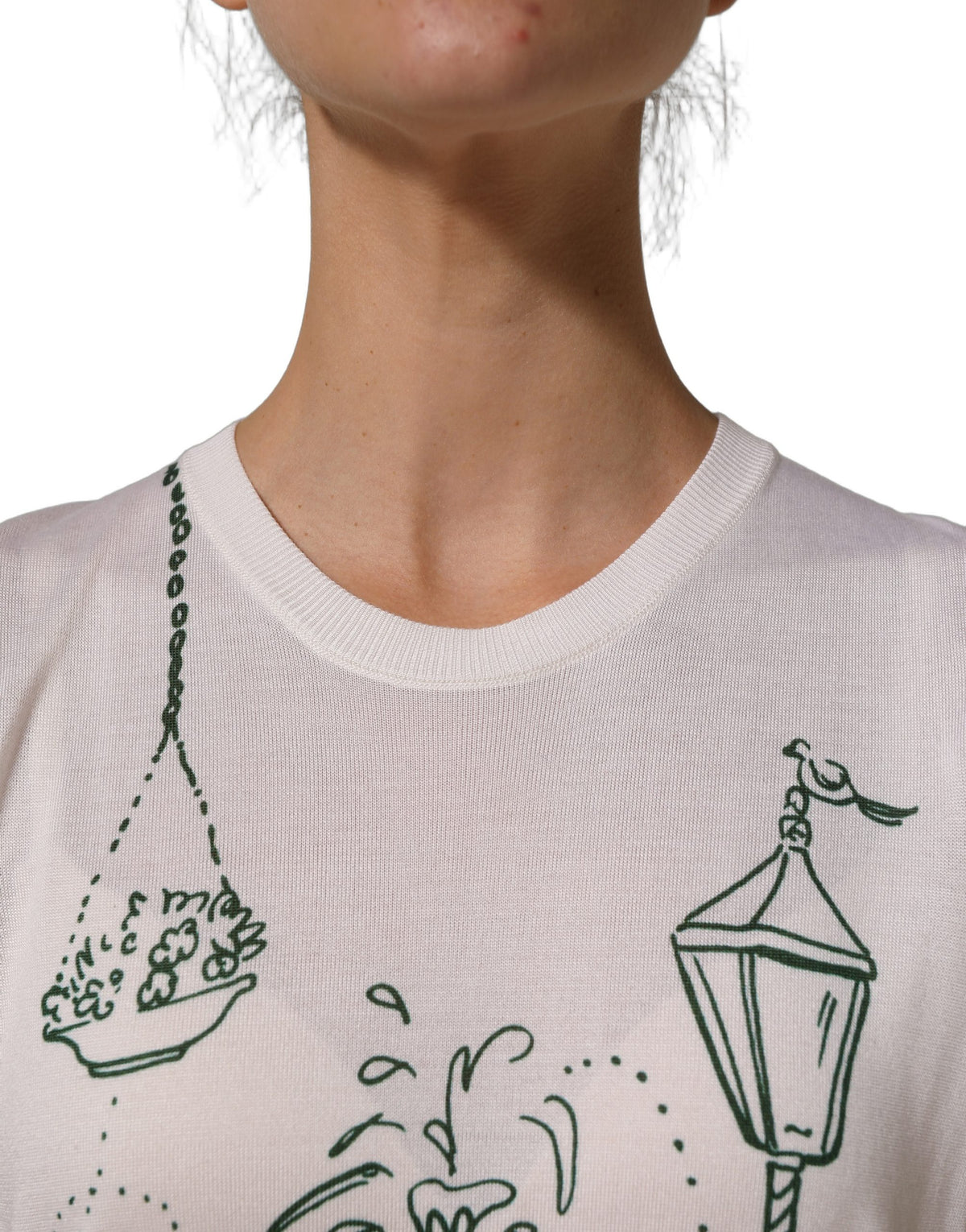 Elevate your wardrobe with the Dolce & Gabbana White Silk Knit Garden Fountain Print Tank Top, a masterpiece of Italian craftsmanship that embodies timeless elegance and luxurious allure.