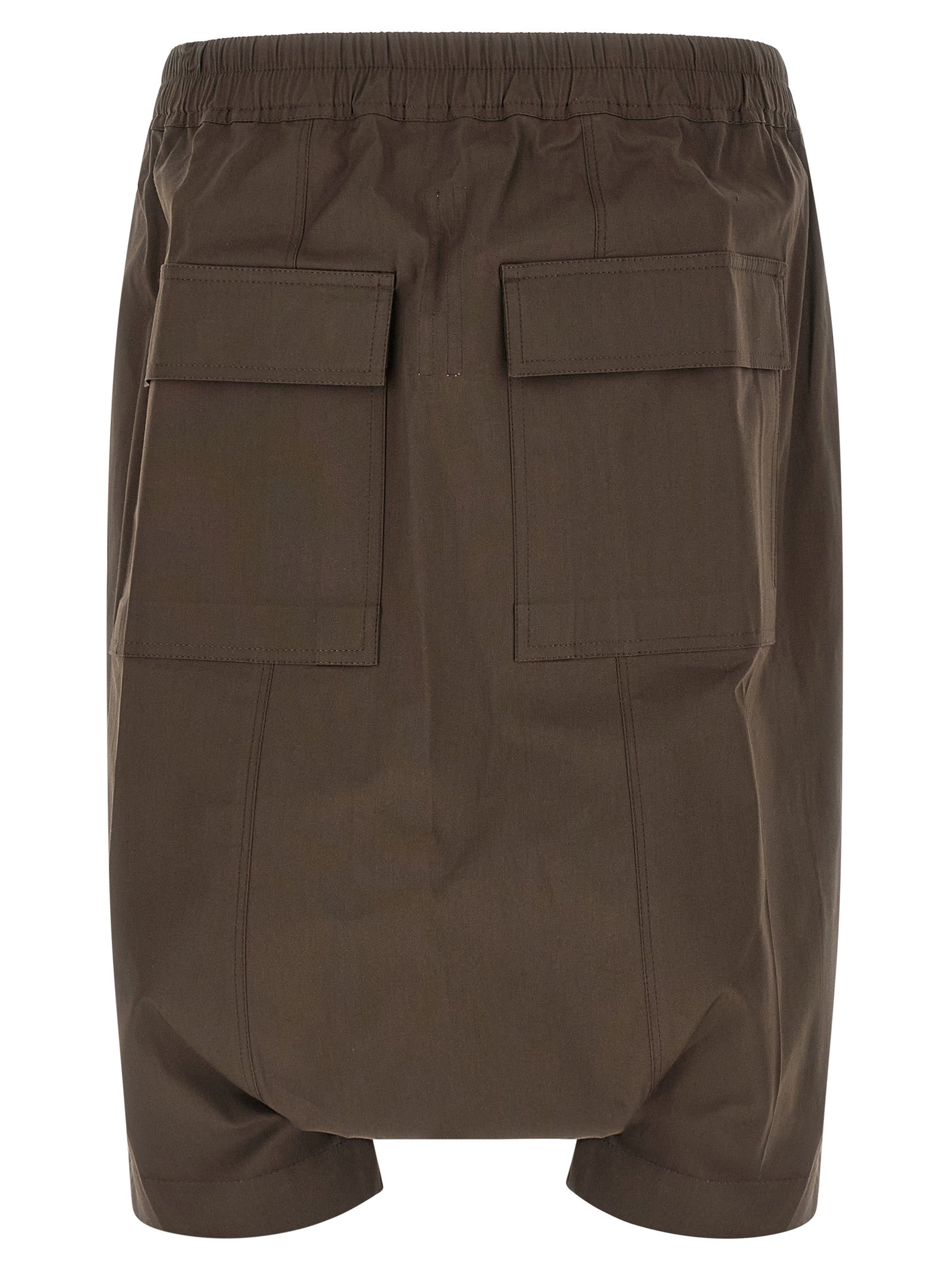 Elevate your wardrobe with Rick Owens Brown Cotton Bermuda Shorts, crafted from luxurious cotton poplin, embodying avant-garde elegance for the discerning individual.