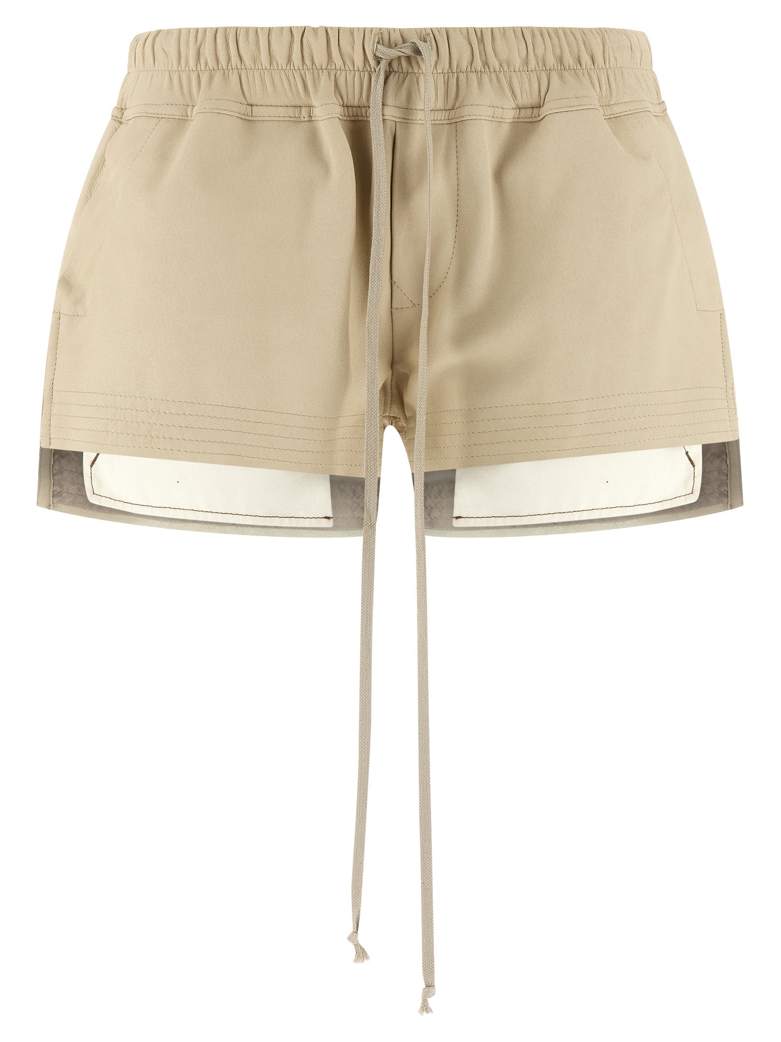 Elevate your style with Rick Owens Beige Lamb Leather Bermuda Shorts from the exclusive ‘Fog Boxers’ collection, where luxurious craftsmanship meets avant-garde allure.
