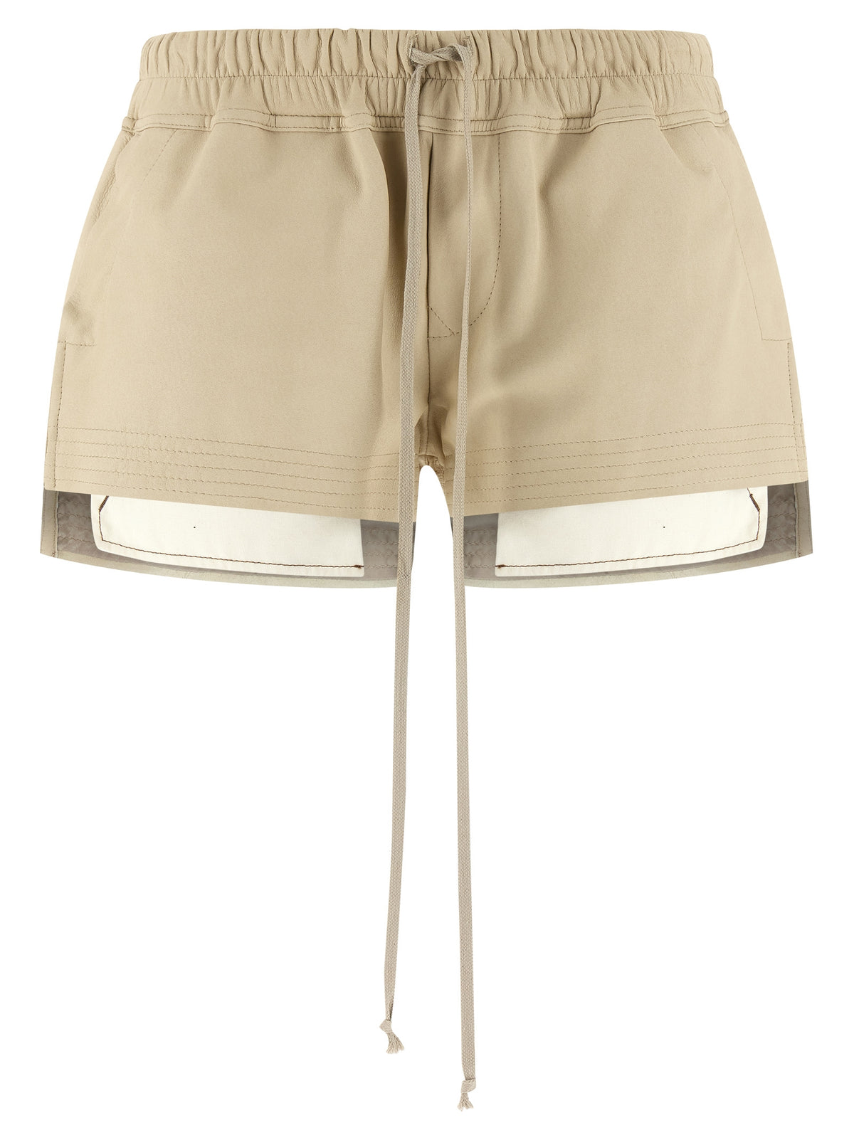 Discover the Rick Owens Beige Lamb Leather Bermuda Shorts, a masterpiece of luxurious craftsmanship that elevates your style with avant-garde elegance and timeless allure.