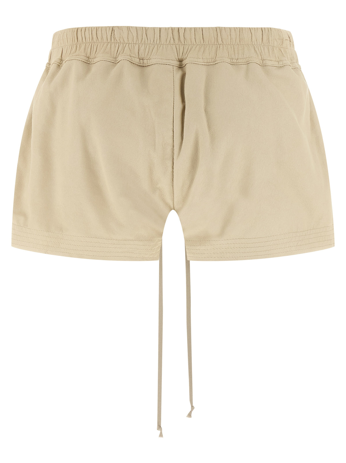 Experience the allure of Rick Owens' Beige Lamb Leather Bermuda Shorts, crafted from sumptuous lamb leather, embodying avant-garde luxury and timeless elegance for the discerning individual.