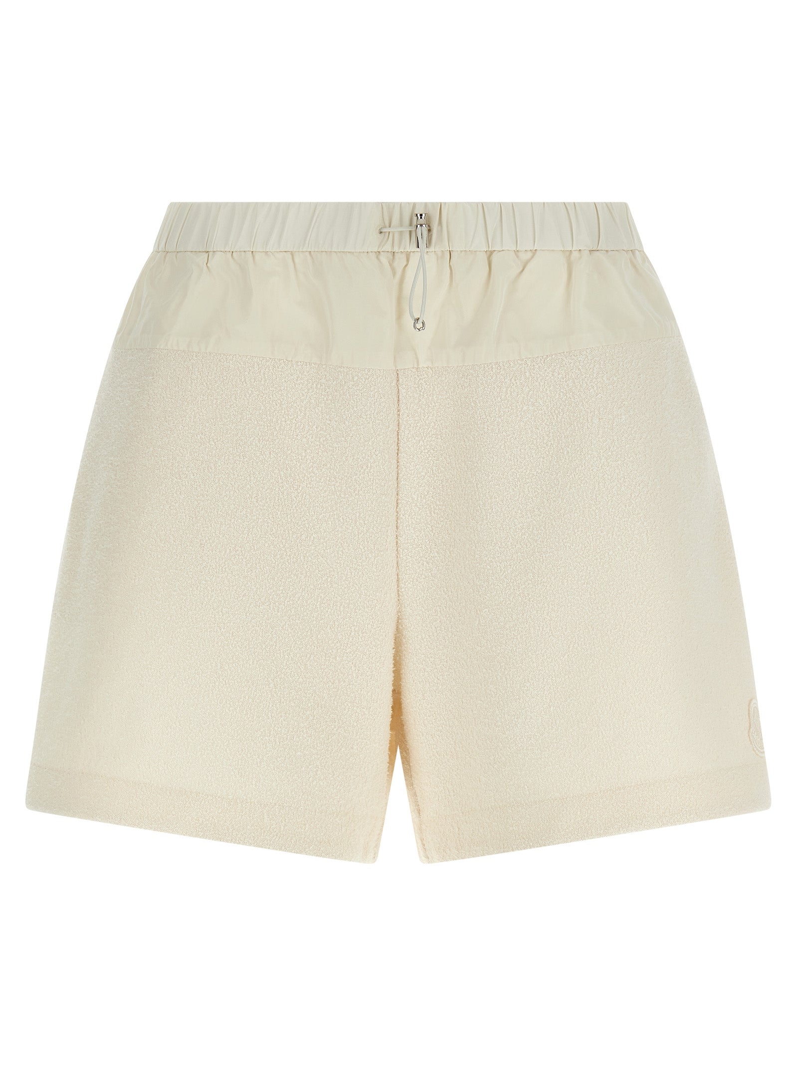 Elevate your summer wardrobe with Moncler White Polyester Bermuda Shorts, crafted from luxurious bouclé fabric, embodying effortless chic and sophistication.