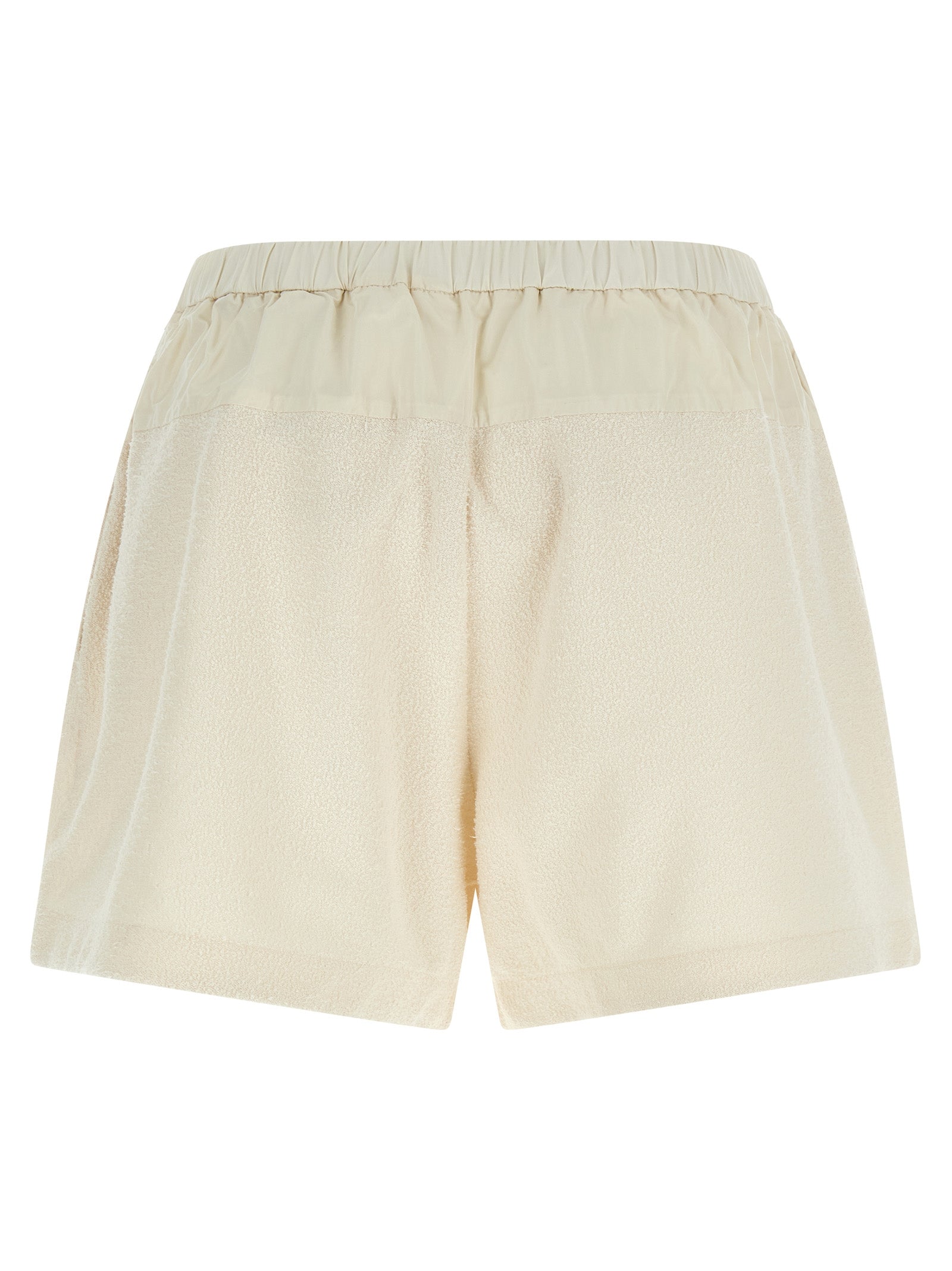 Elevate your wardrobe with Moncler's White Polyester Bermuda Shorts, crafted from luxurious bouclé fabric for effortless chic and sophistication in every step.