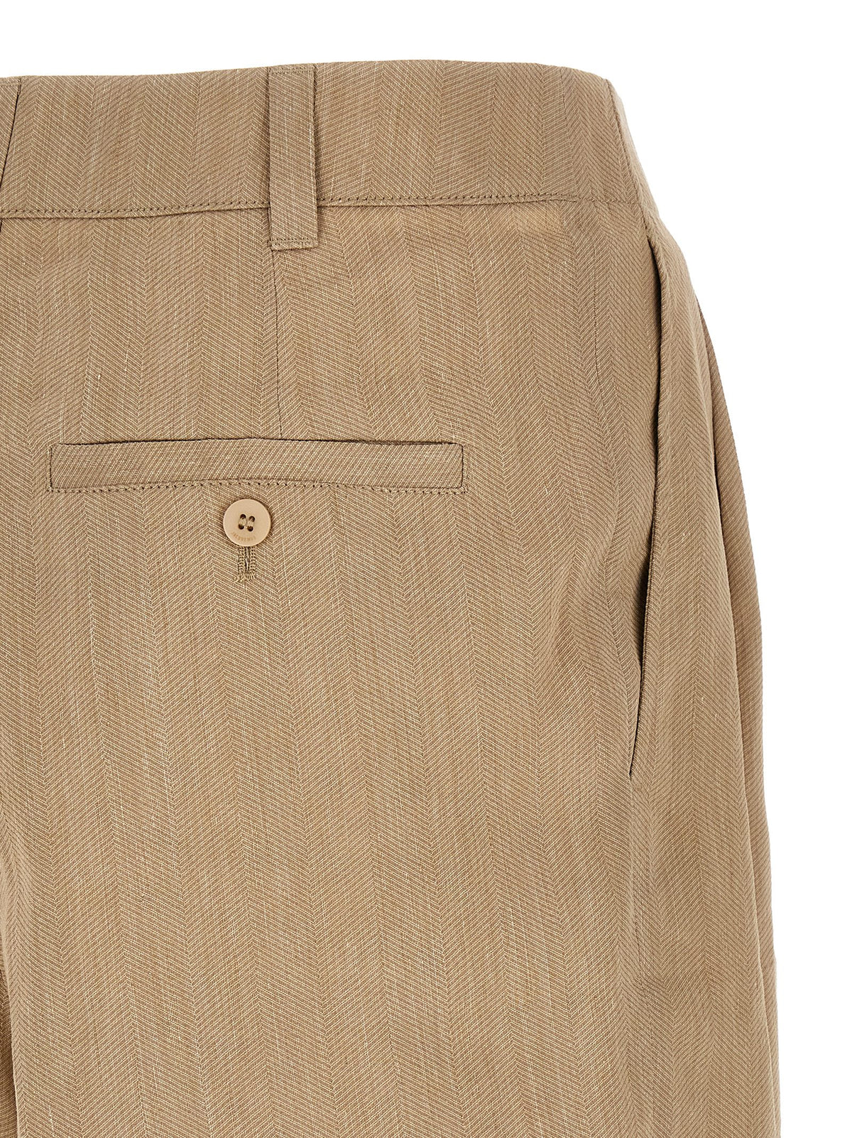 Indulge in the Jacquemus Beige Linen Bermuda Shorts, a masterpiece of textured luxury, crafted for effortless elegance and refined sophistication in every moment.
