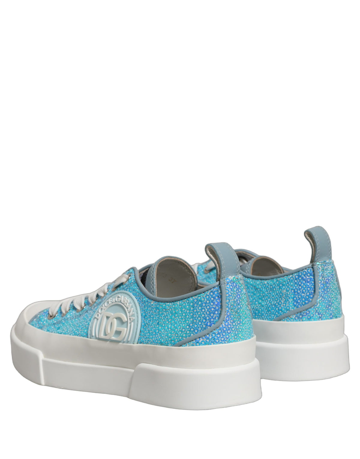 Step into a realm of elegance with Dolce & Gabbana's Blue White Sequin Logo Low Top Sneakers, where Italian craftsmanship meets luxurious comfort, perfect for the discerning individual.