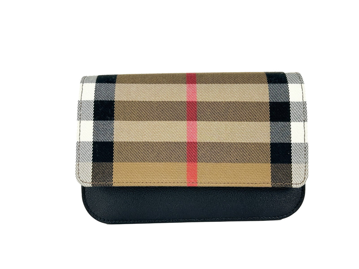 Indulge in the exquisite craftsmanship of the Burberry Small Leather Madison Crossbody Check Bag, a timeless accessory that embodies luxury and sophistication for any occasion.