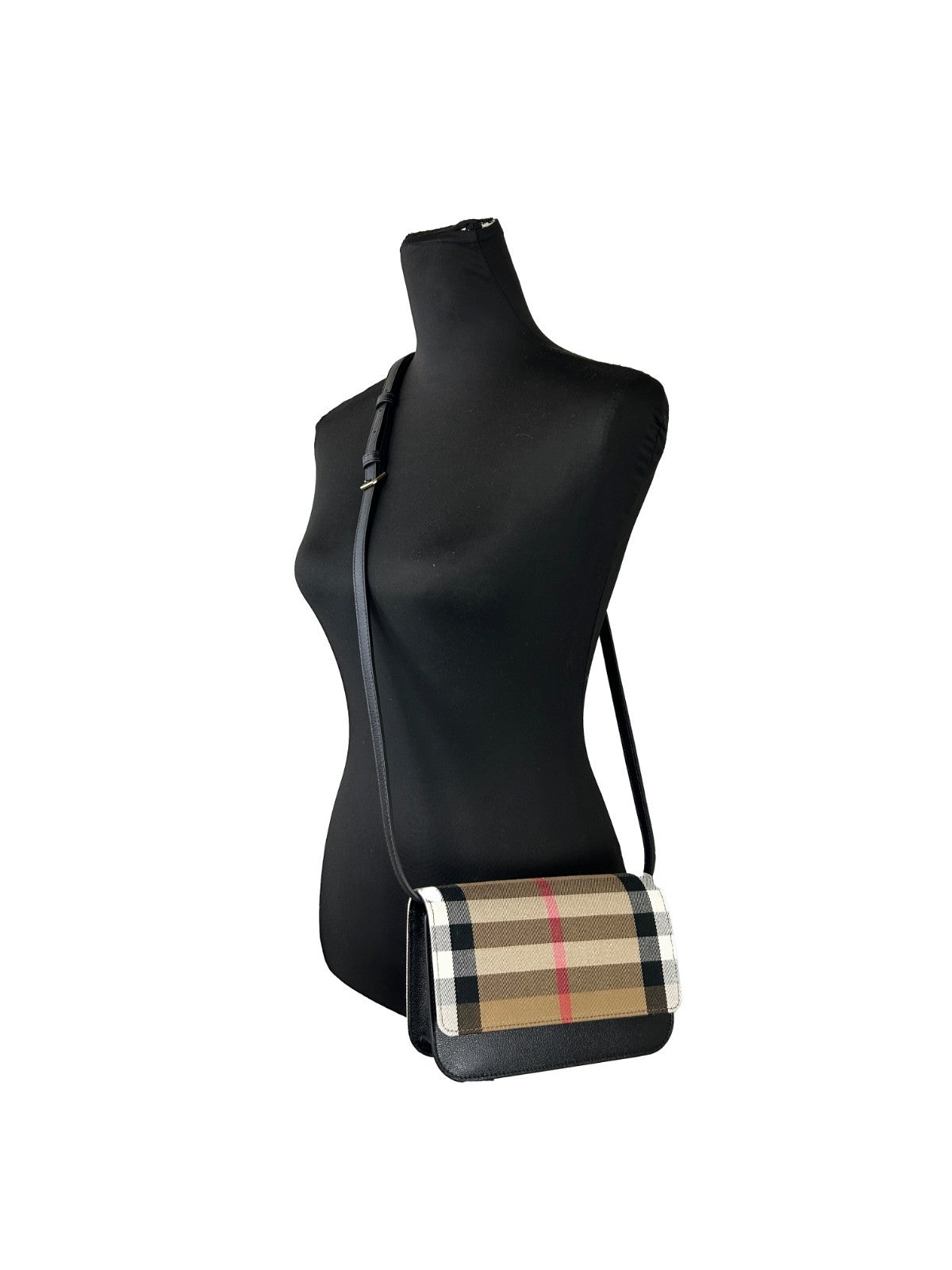 Discover the Burberry Small Leather Madison Crossbody Check Bag, a fusion of exquisite leather and canvas, embodying timeless elegance and sophisticated charm for every occasion.