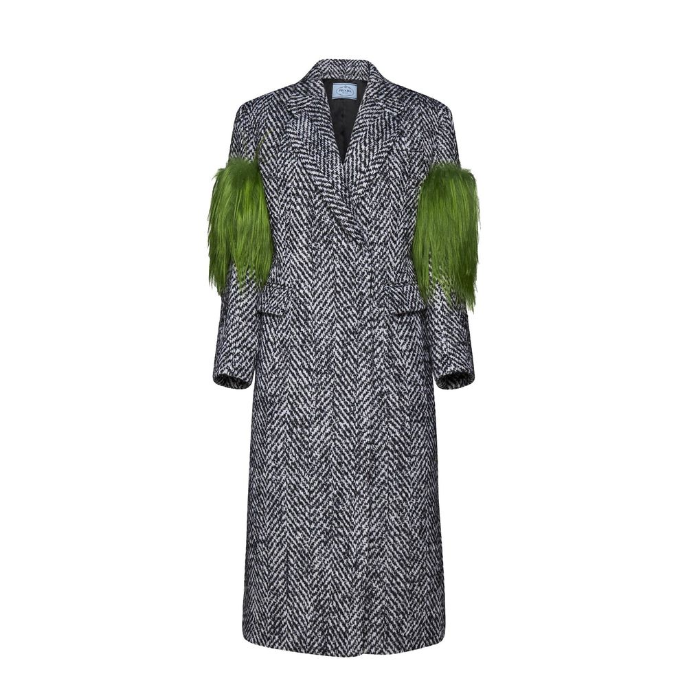 Indulge in the exquisite Prada Gray Wool Coat, a masterpiece of herringbone elegance, crafted from luxurious wool blend for timeless sophistication.