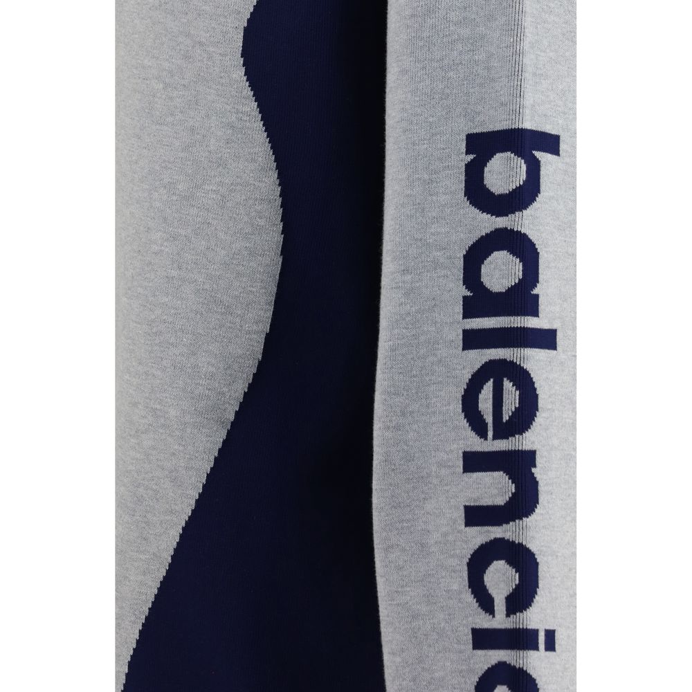 Discover the Balenciaga Gray Cotton Sweatshirt, a luxurious blend of cotton and polyamide, redefining sportswear with its sophisticated design and exquisite craftsmanship.