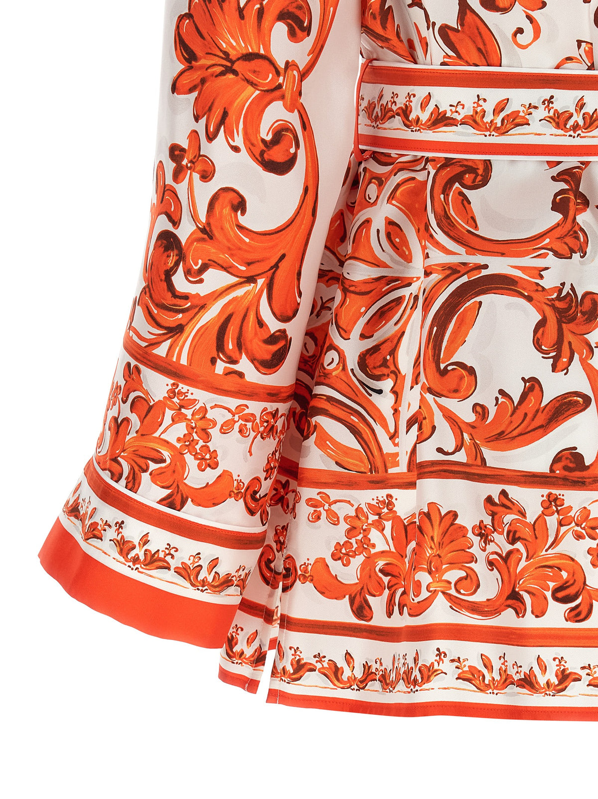 Elevate your wardrobe with the Dolce & Gabbana Orange Silk Blouse, a masterpiece of Italian craftsmanship that embodies Mediterranean elegance and timeless allure.