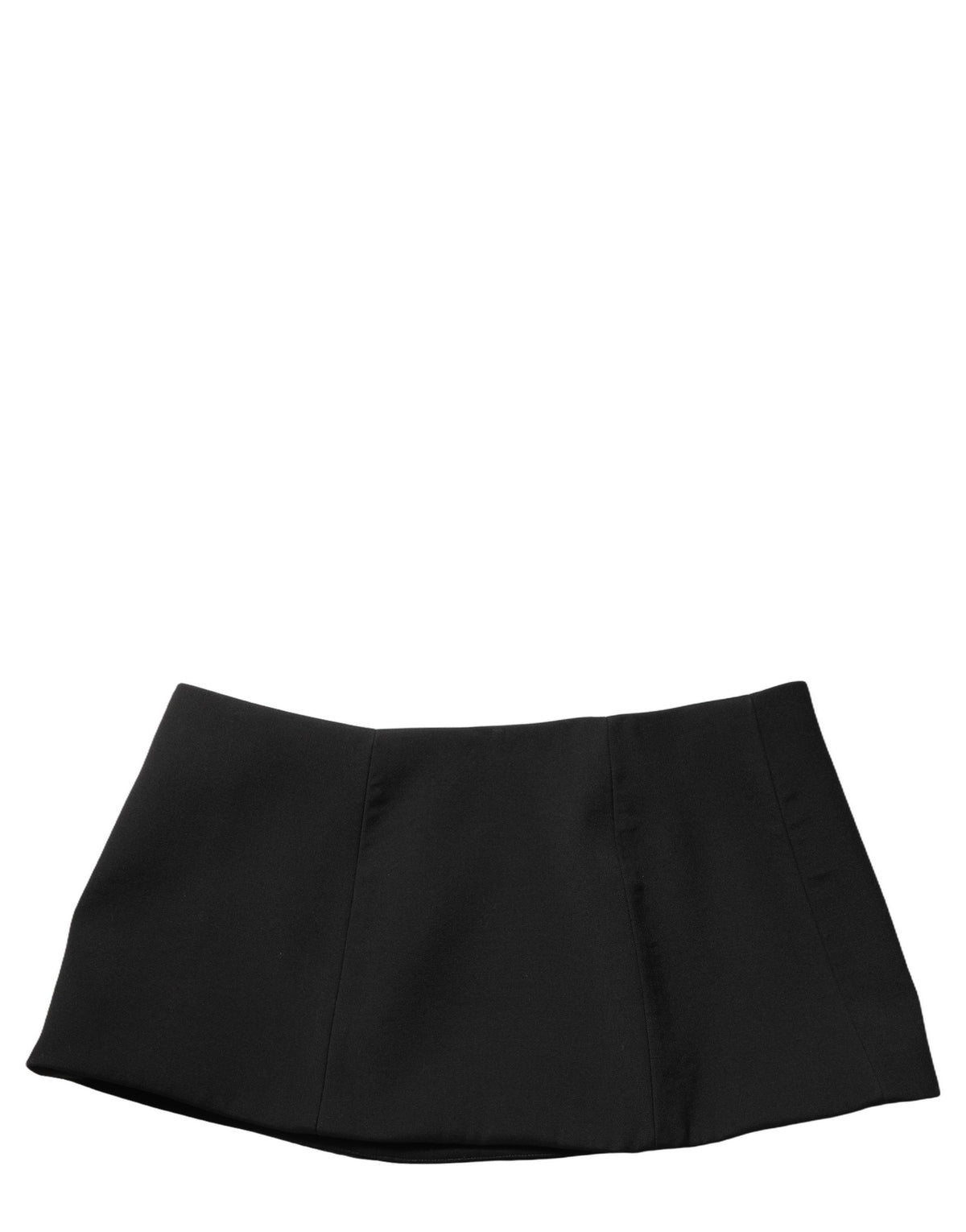 Indulge in the timeless elegance of the Dolce & Gabbana Black Wool A-line Low Waist Mini Skirt, crafted from luxurious virgin wool for a sophisticated silhouette that captivates.