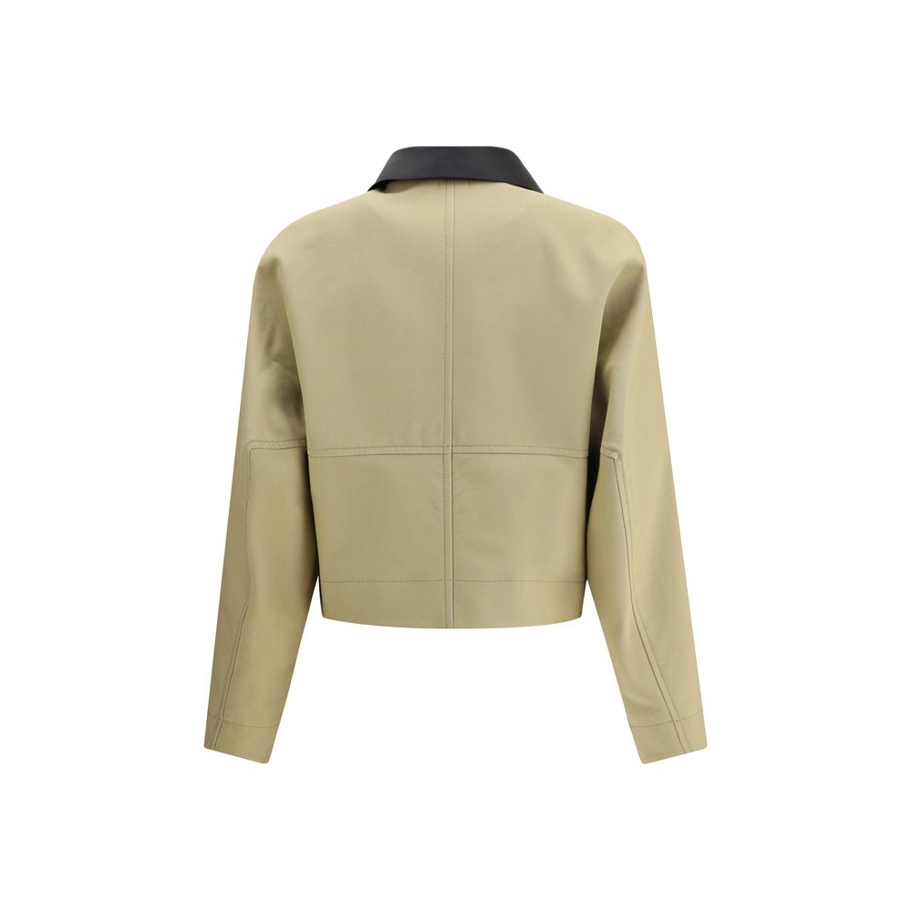 Elevate your style with Givenchy's Beige Cotton Clothing, a luxurious blend of cotton and wool, reimagining a classic silhouette for the modern connoisseur.