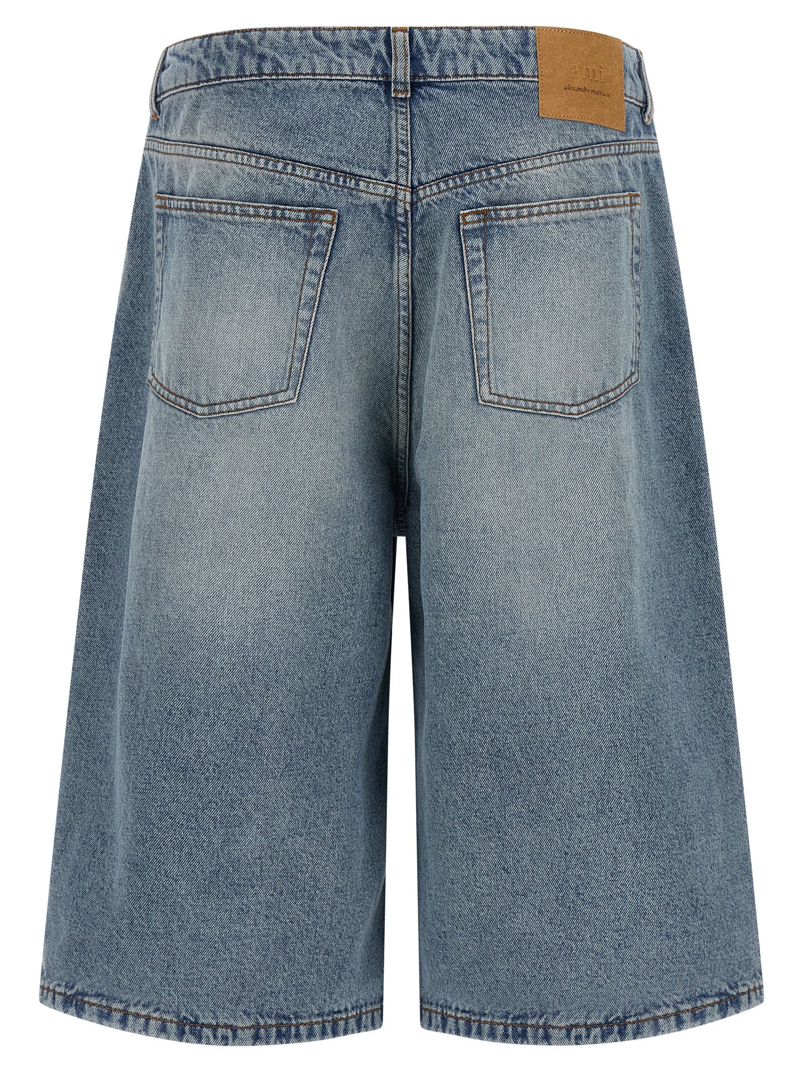 Elevate your style with the Ami Paris Blue Cotton Bermuda Shorts, crafted from luxurious cotton for a sophisticated yet relaxed aesthetic, perfect for the modern trendsetter.