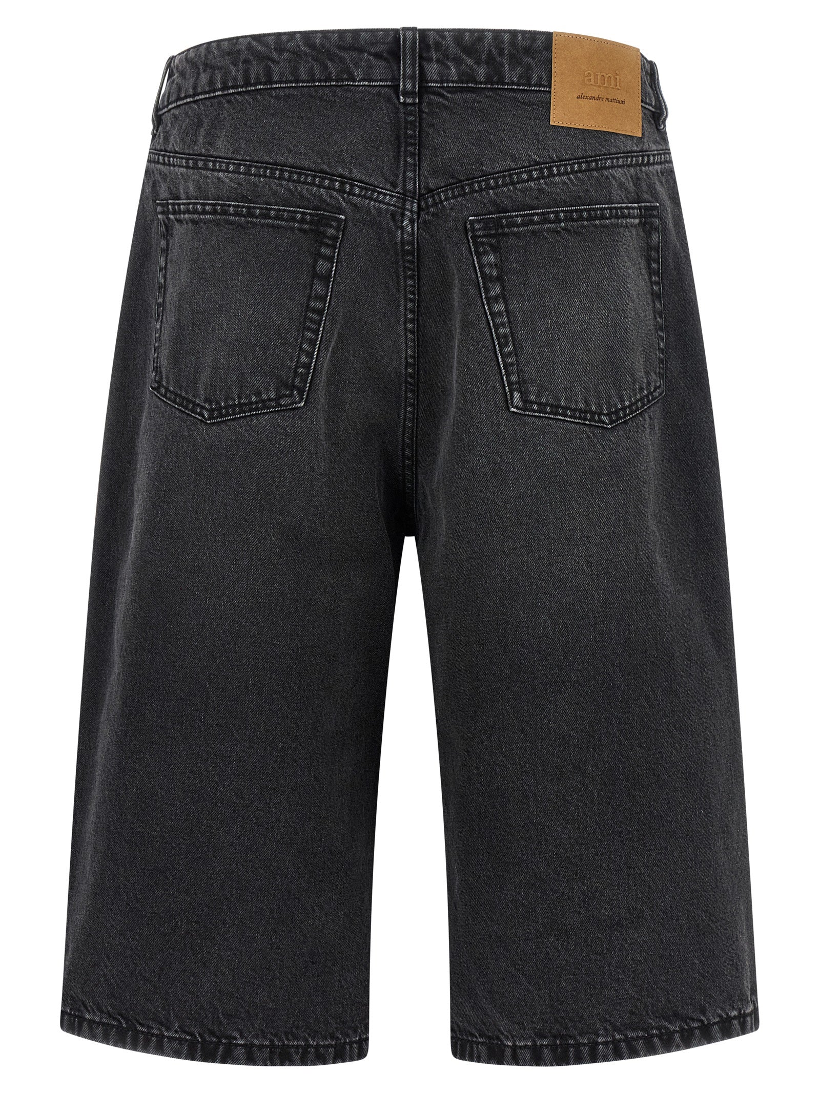 Indulge in the luxurious allure of AMI PARIS Black Cotton Bermuda Shorts, crafted from 100% cotton for effortless elegance and a bold silhouette that redefines sophistication.